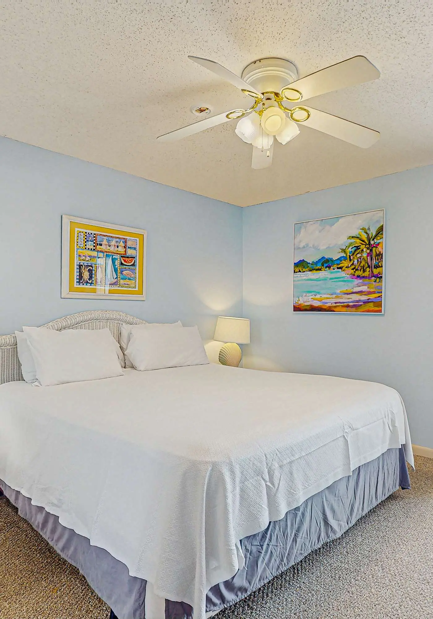 Beachfront condo with enclosed balcony, pool, views, central AC, & grill