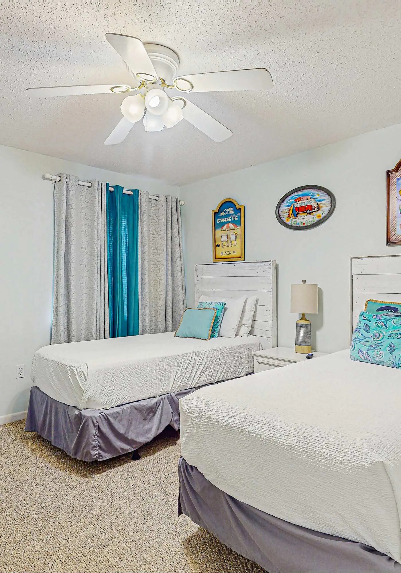 Beachfront condo with enclosed balcony, pool, views, central AC, & grill