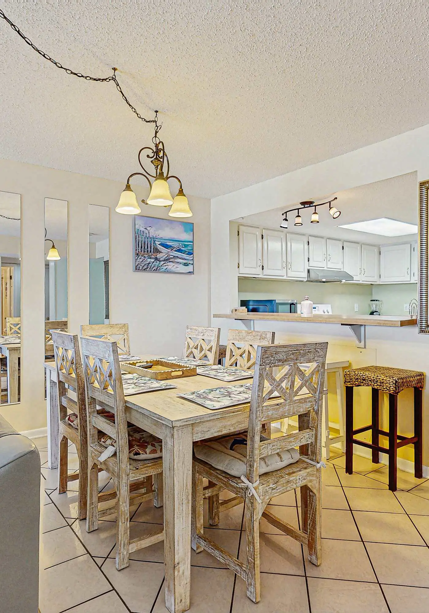Beachfront condo with enclosed balcony, pool, views, central AC, & grill