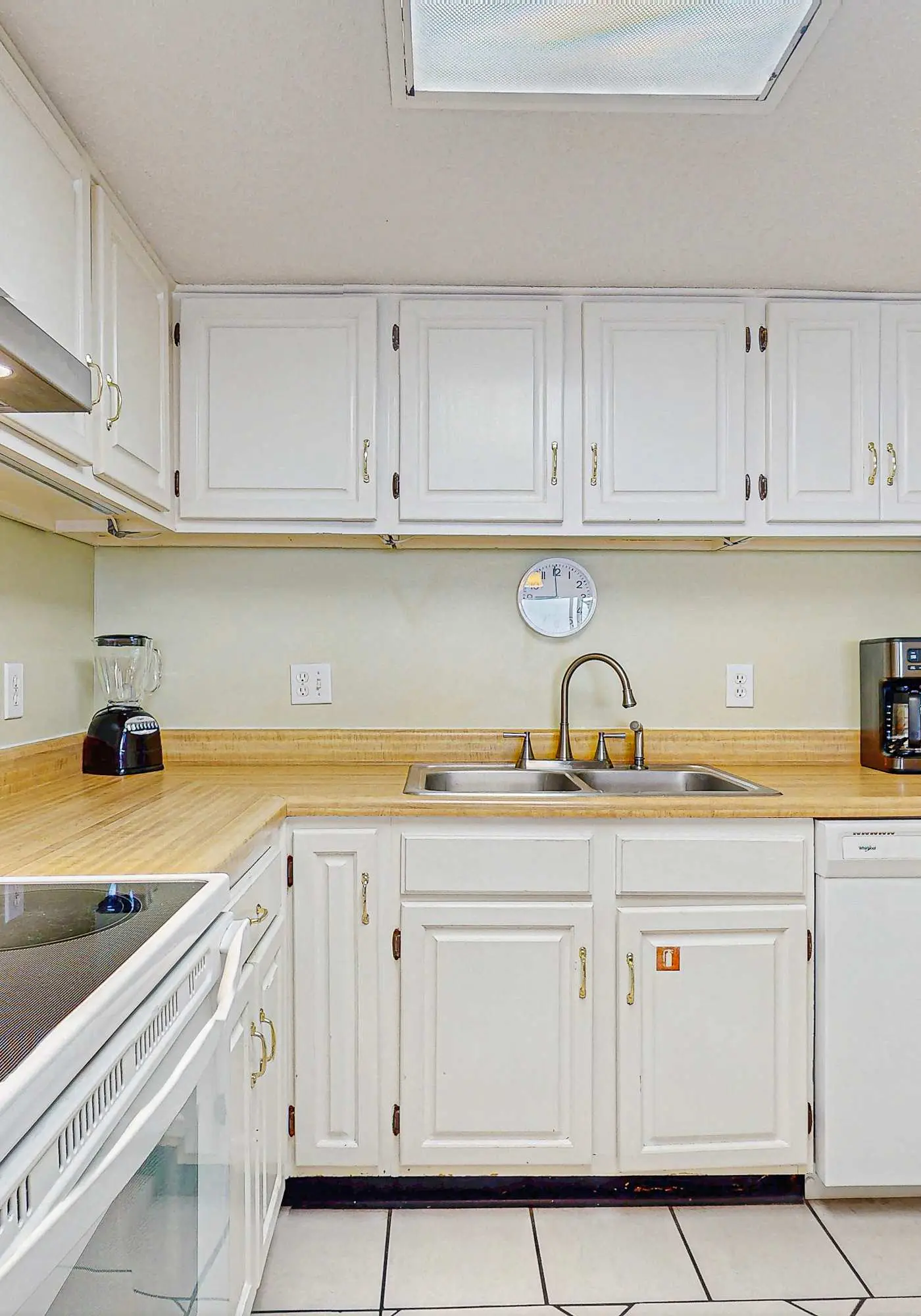 Beachfront condo with enclosed balcony, pool, views, central AC, & grill
