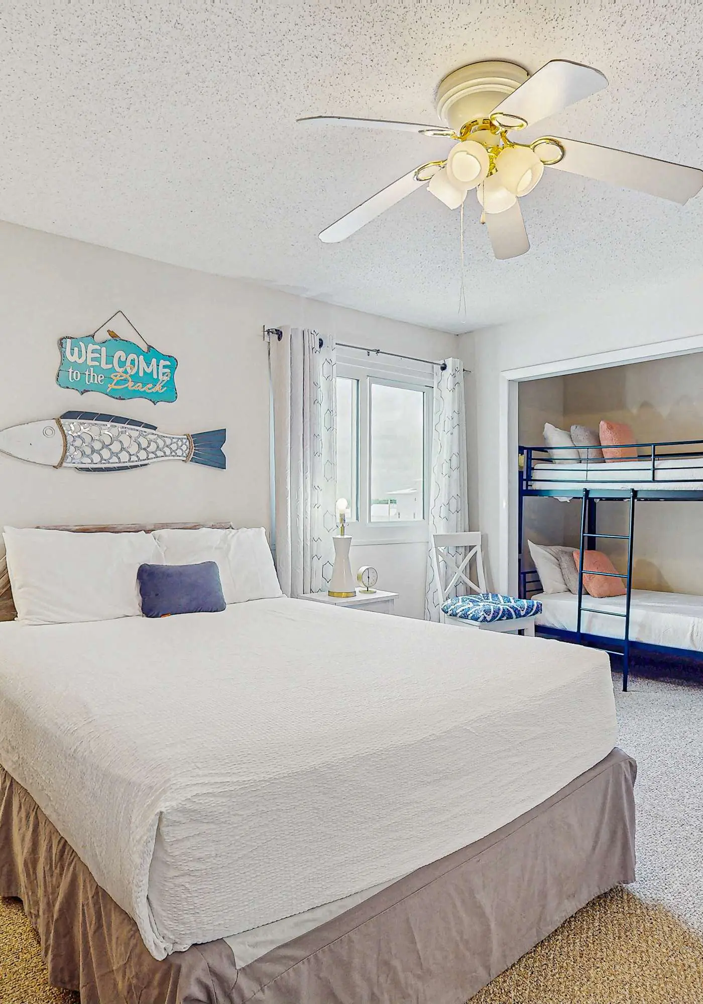 Beachfront condo with enclosed balcony, pool, views, central AC, & grill