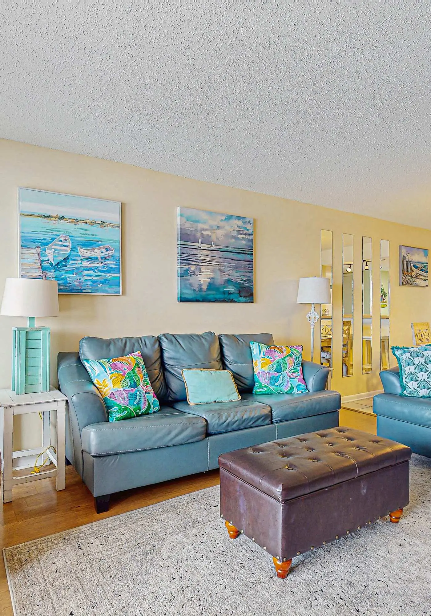 Beachfront condo with enclosed balcony, pool, views, central AC, & grill