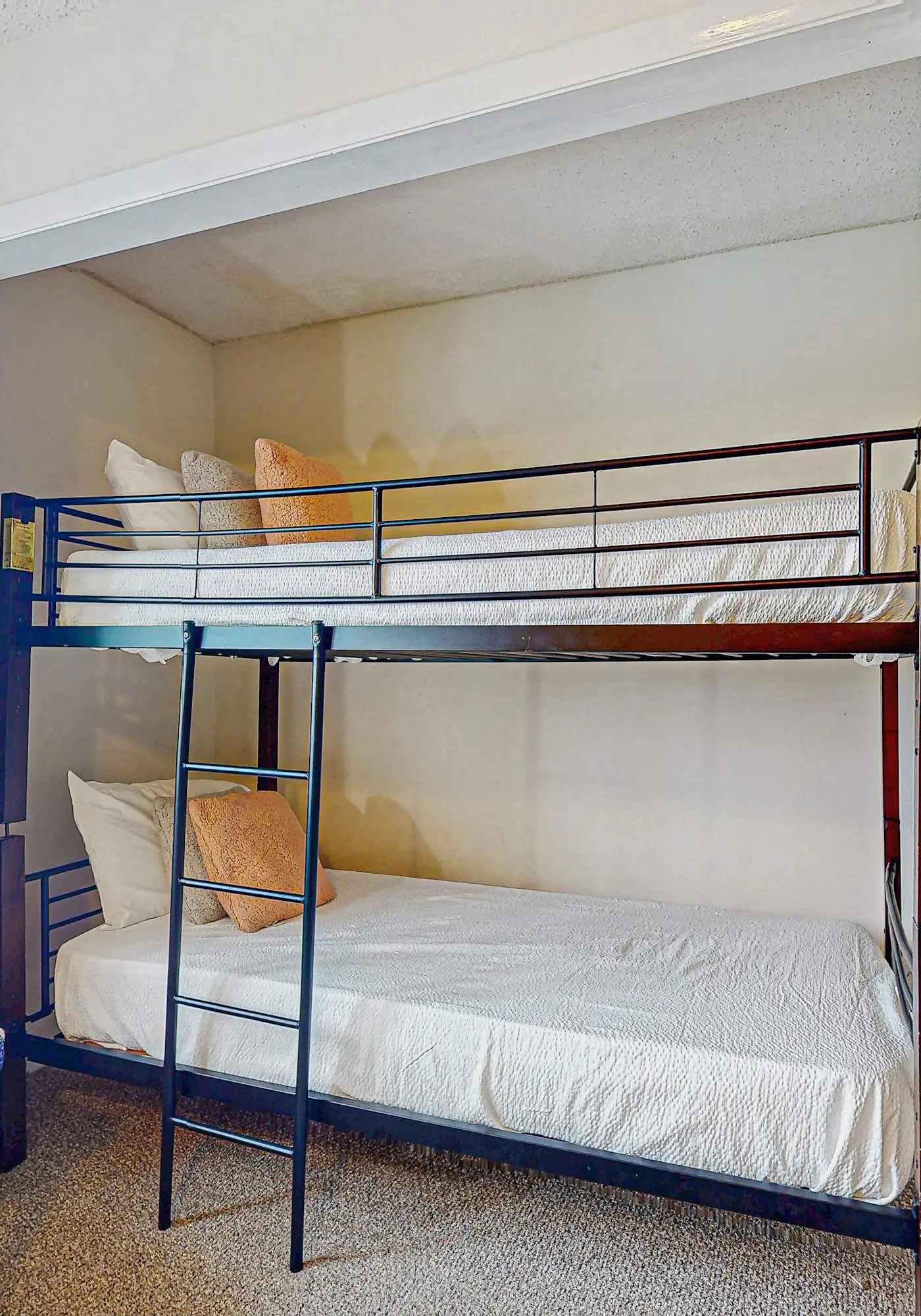 Beachfront condo with enclosed balcony, pool, views, central AC, & grill