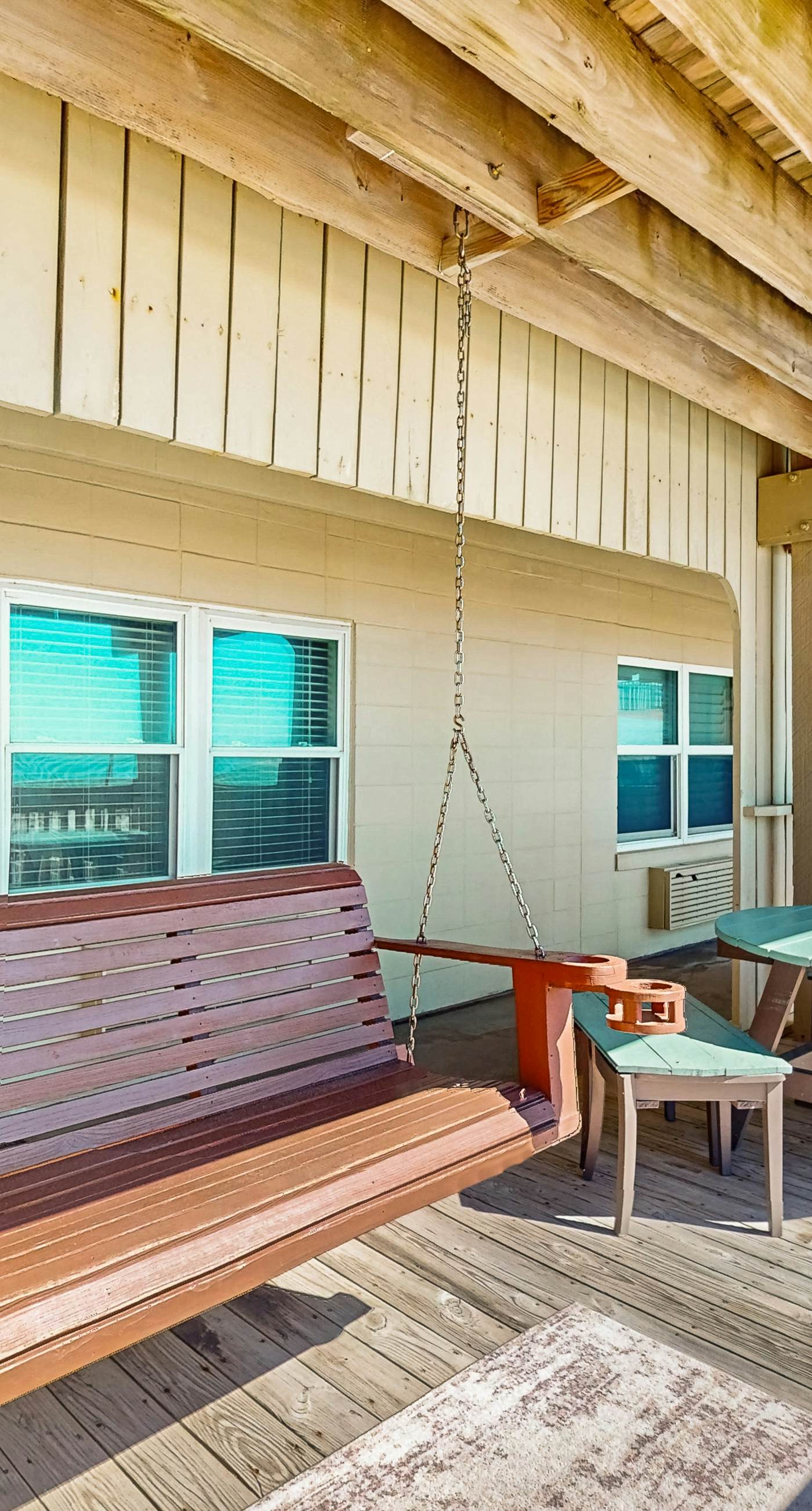 Ocean-view condo with pool access, outdoor seating, central AC & WiFi