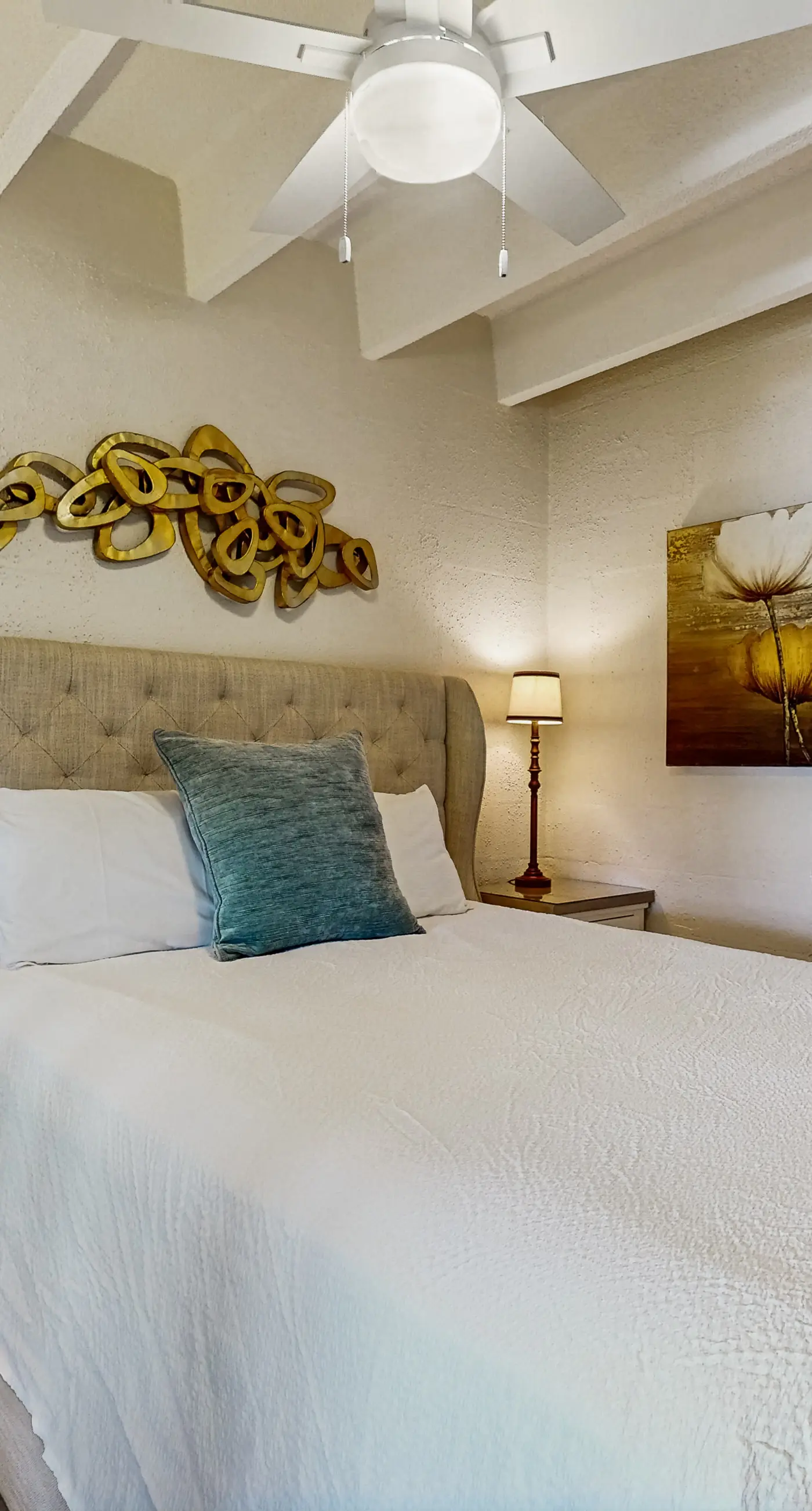 Ocean-view condo with pool access, outdoor seating, central AC & WiFi