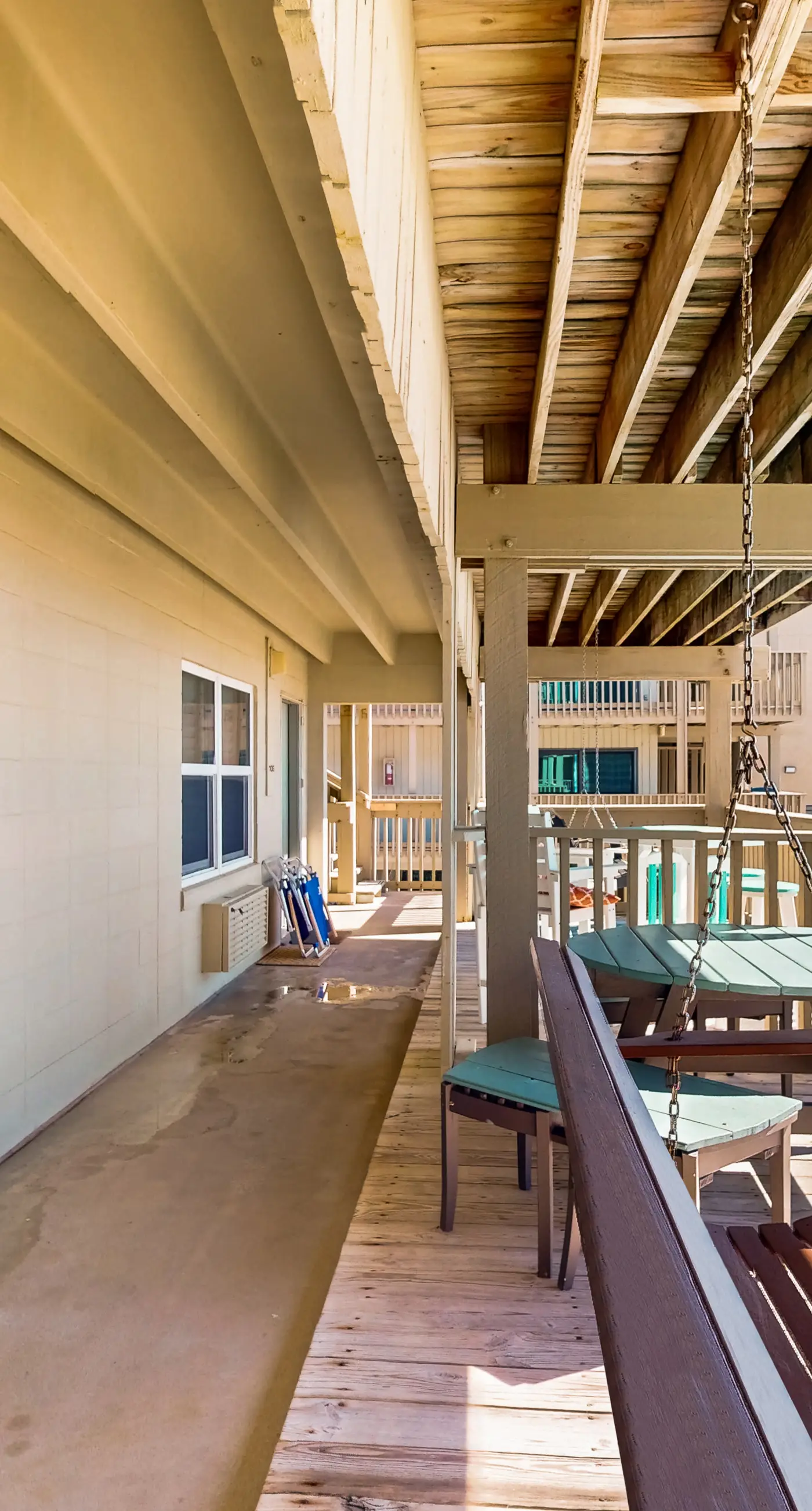 Ocean-view condo with pool access, outdoor seating, central AC & WiFi