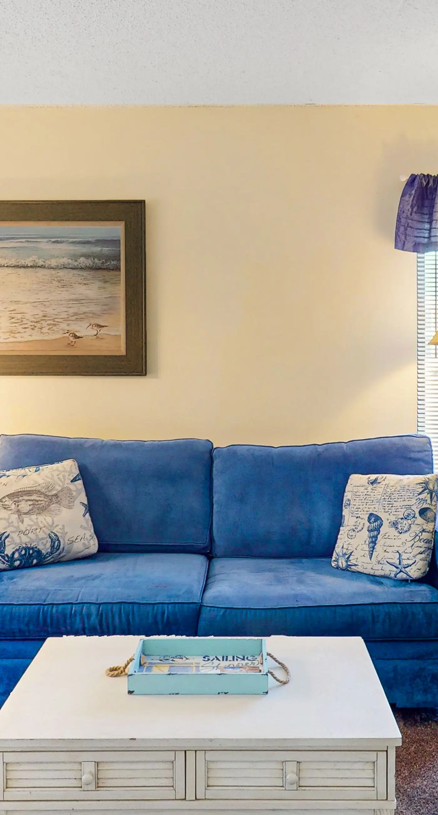 Convenient condo with balcony, beach views, pool, & central AC