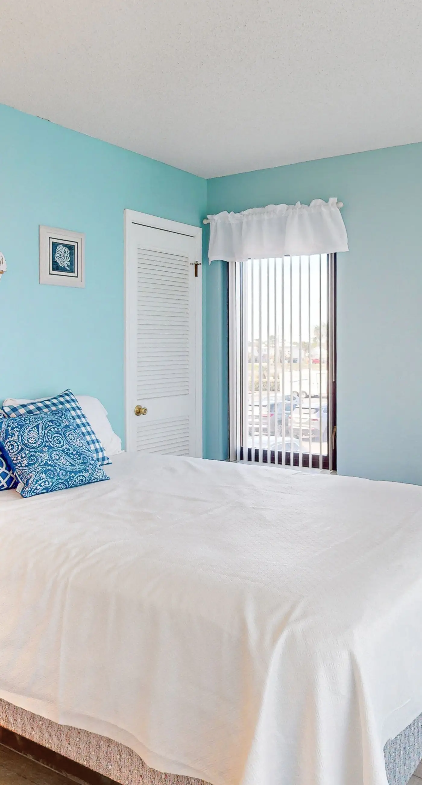 Convenient condo with balcony, beach views, pool, & central AC