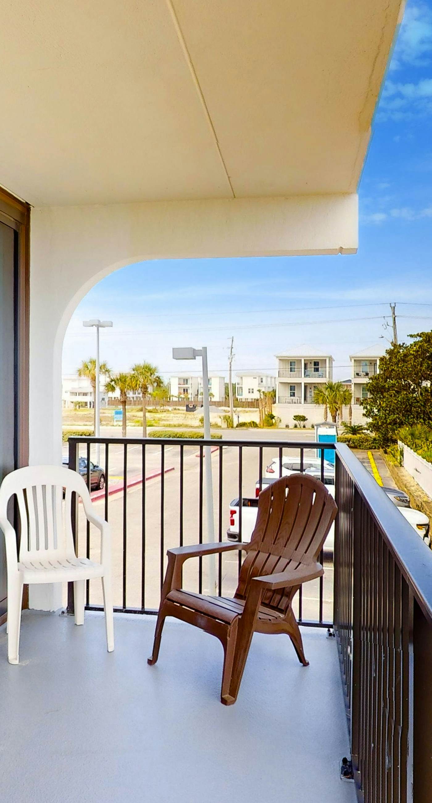 Convenient condo with balcony, beach views, pool, & central AC