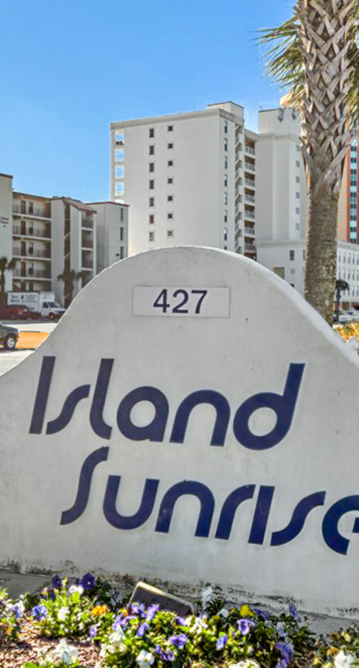 Convenient condo with balcony, beach views, pool, & central AC