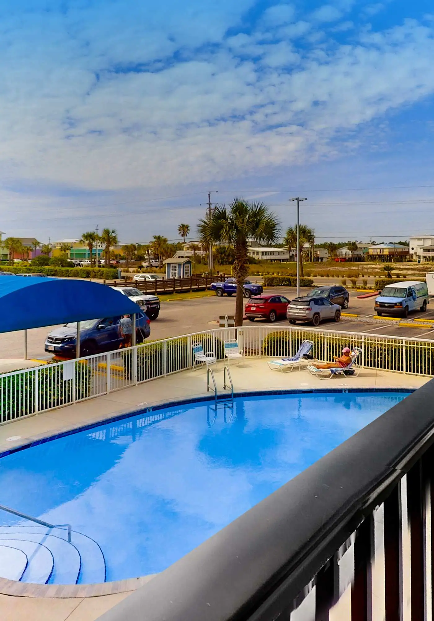 Convenient condo with balcony, beach views, pool, & central AC
