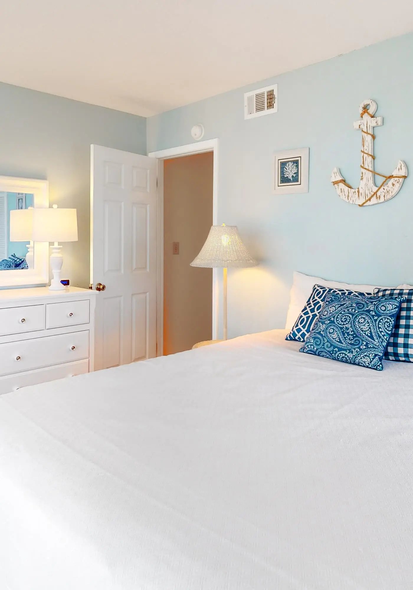 Convenient condo with balcony, beach views, pool, & central AC