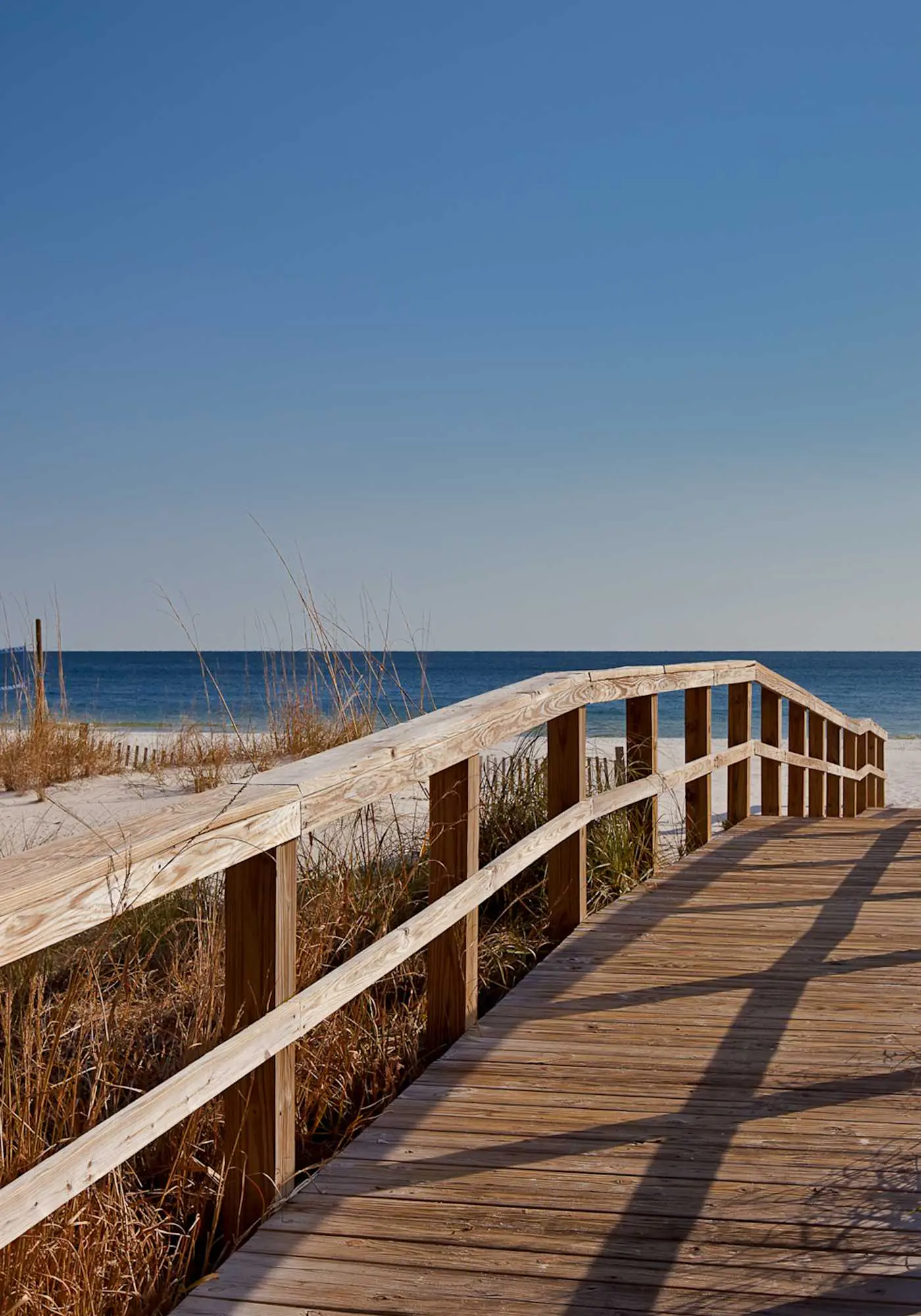 Waterfront home with a private deck, gas grill, WiFi, & central AC