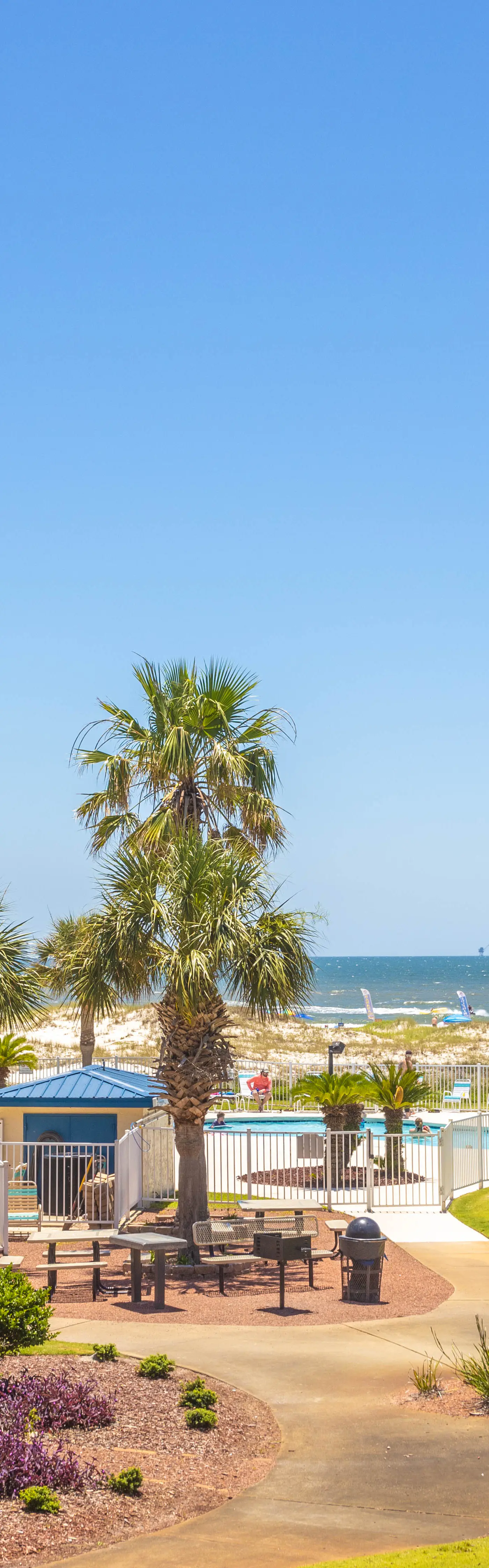 Gulf-view condo in beachfront building with pools, hot tub & tennis