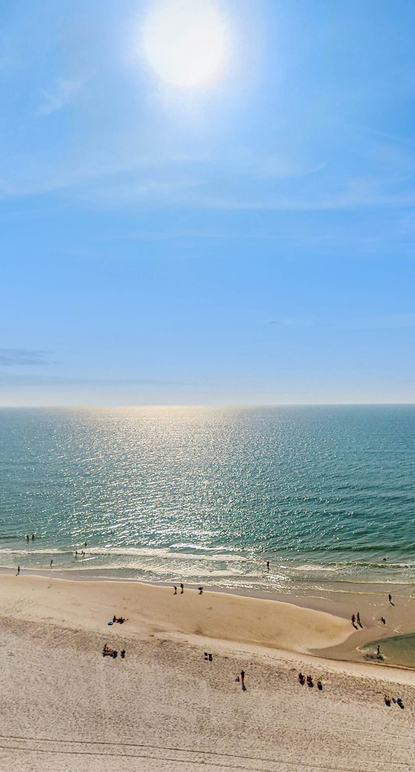 Family-friendly Gulf-front condo with private balcony, hot tub, pool, & gym