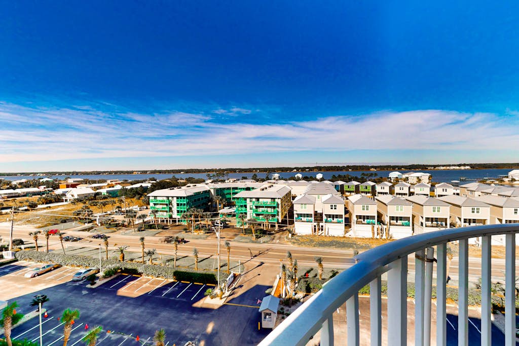 Gulf-front condo with beach views, balcony, central AC & pool