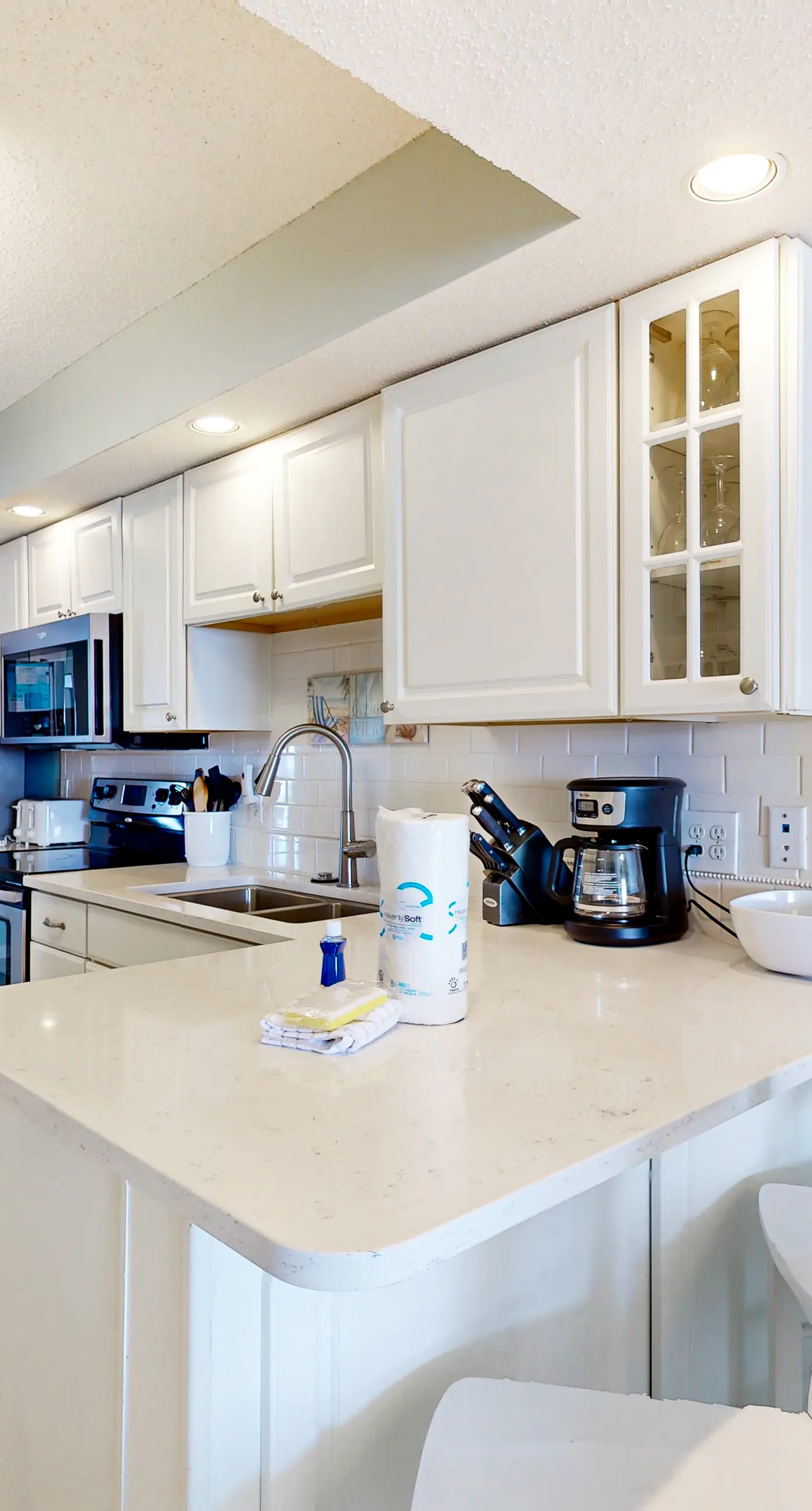 Gulf-front condo with beach views, balcony, central AC & pool