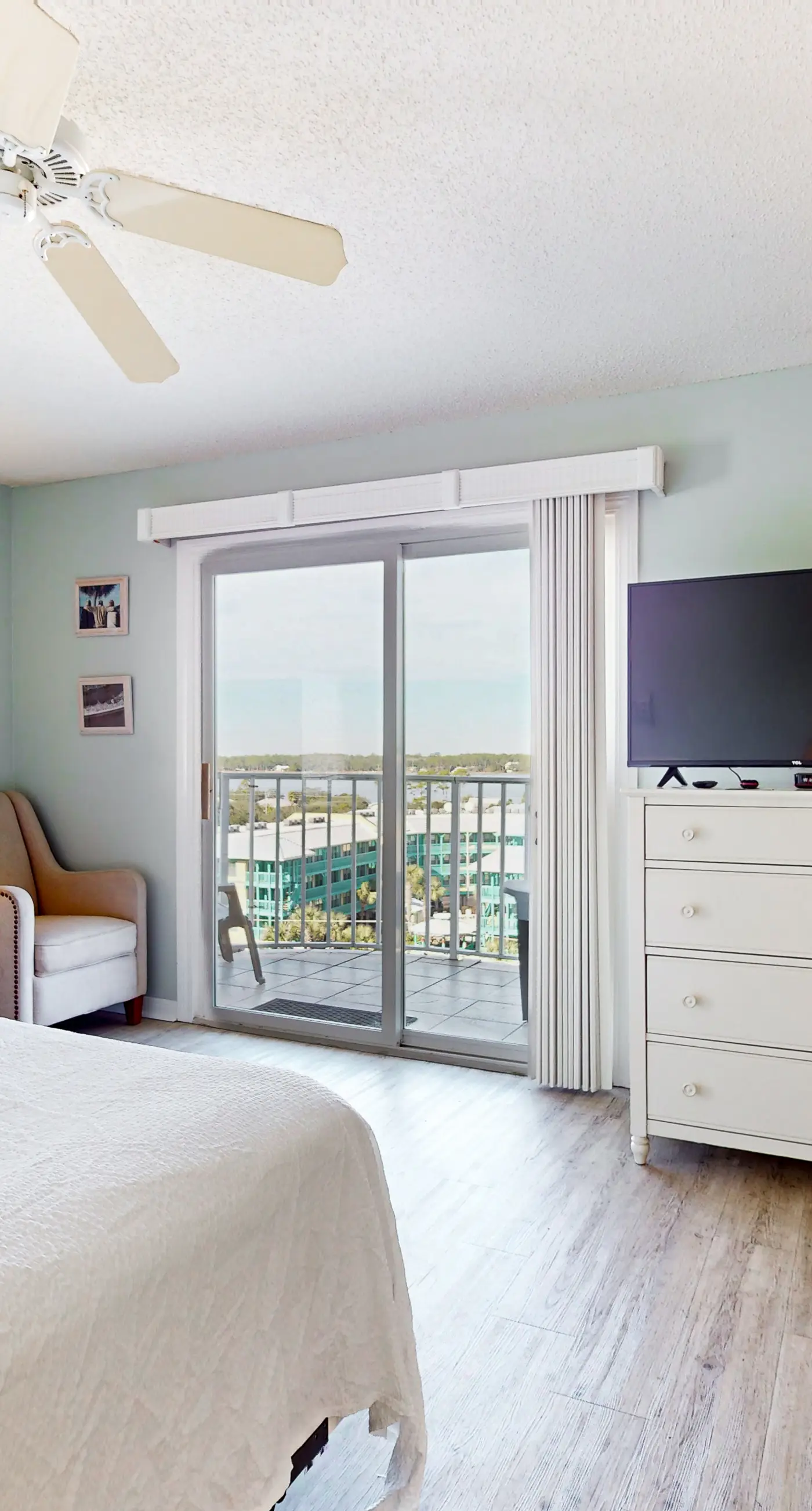 Gulf-front condo with beach views, balcony, central AC & pool