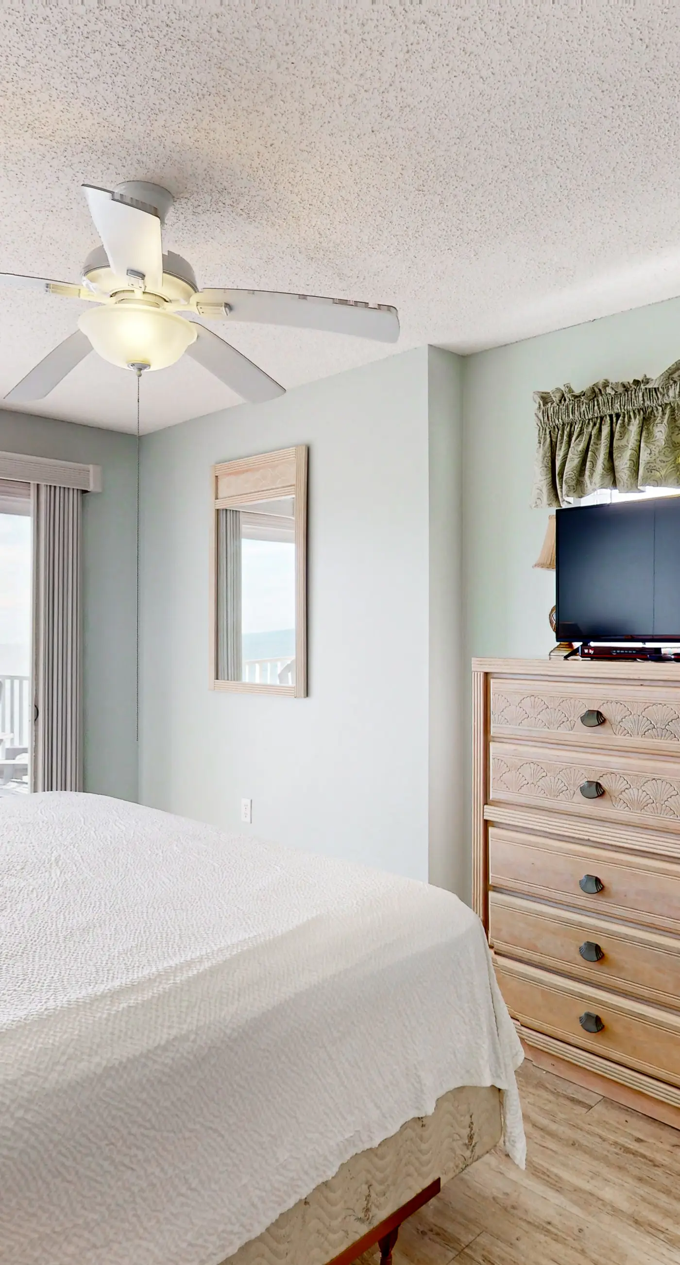 Gulf-front condo with beach views, balcony, central AC & pool