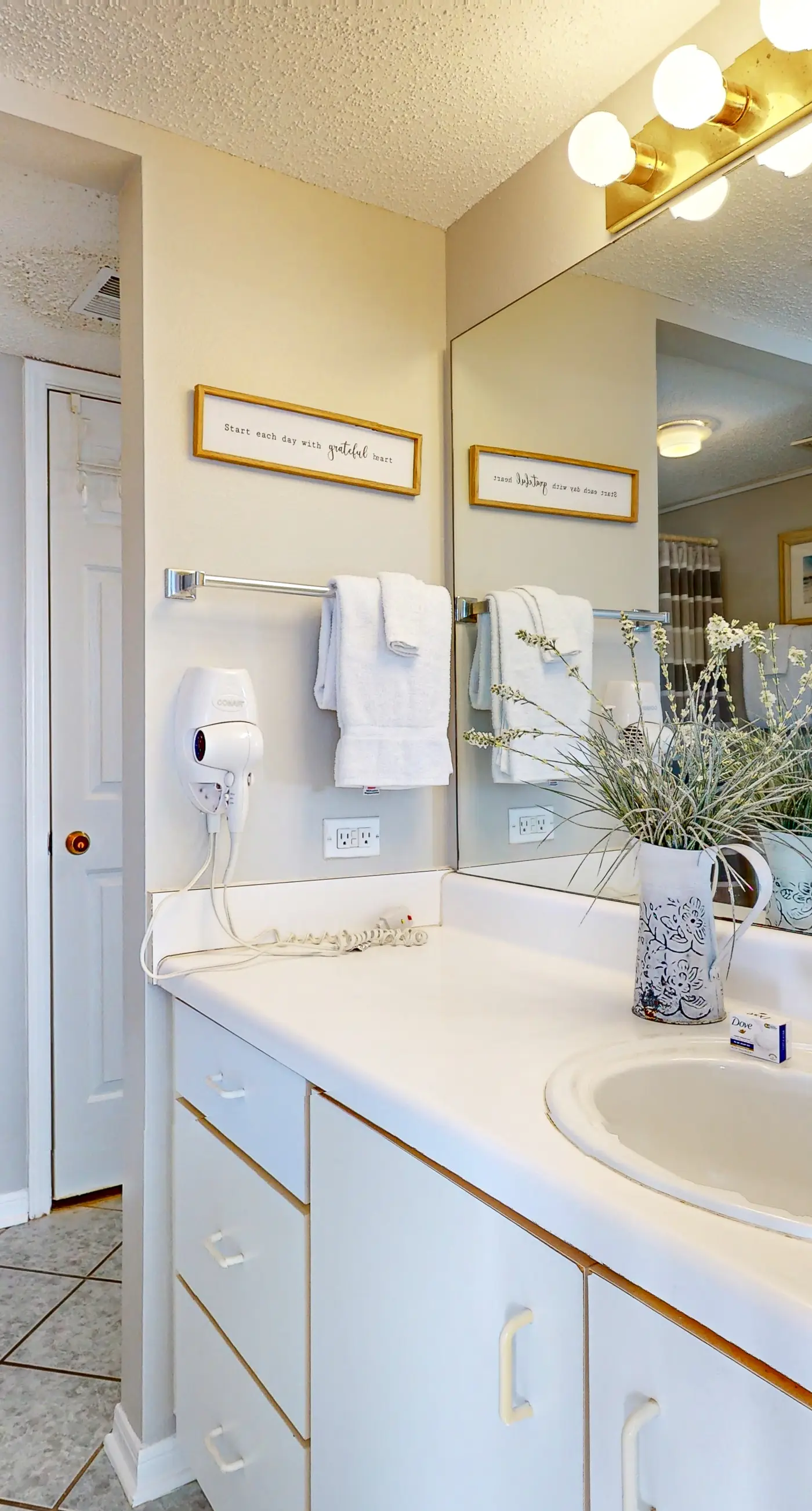 Gulf-front condo with beach views, balcony, central AC & pool