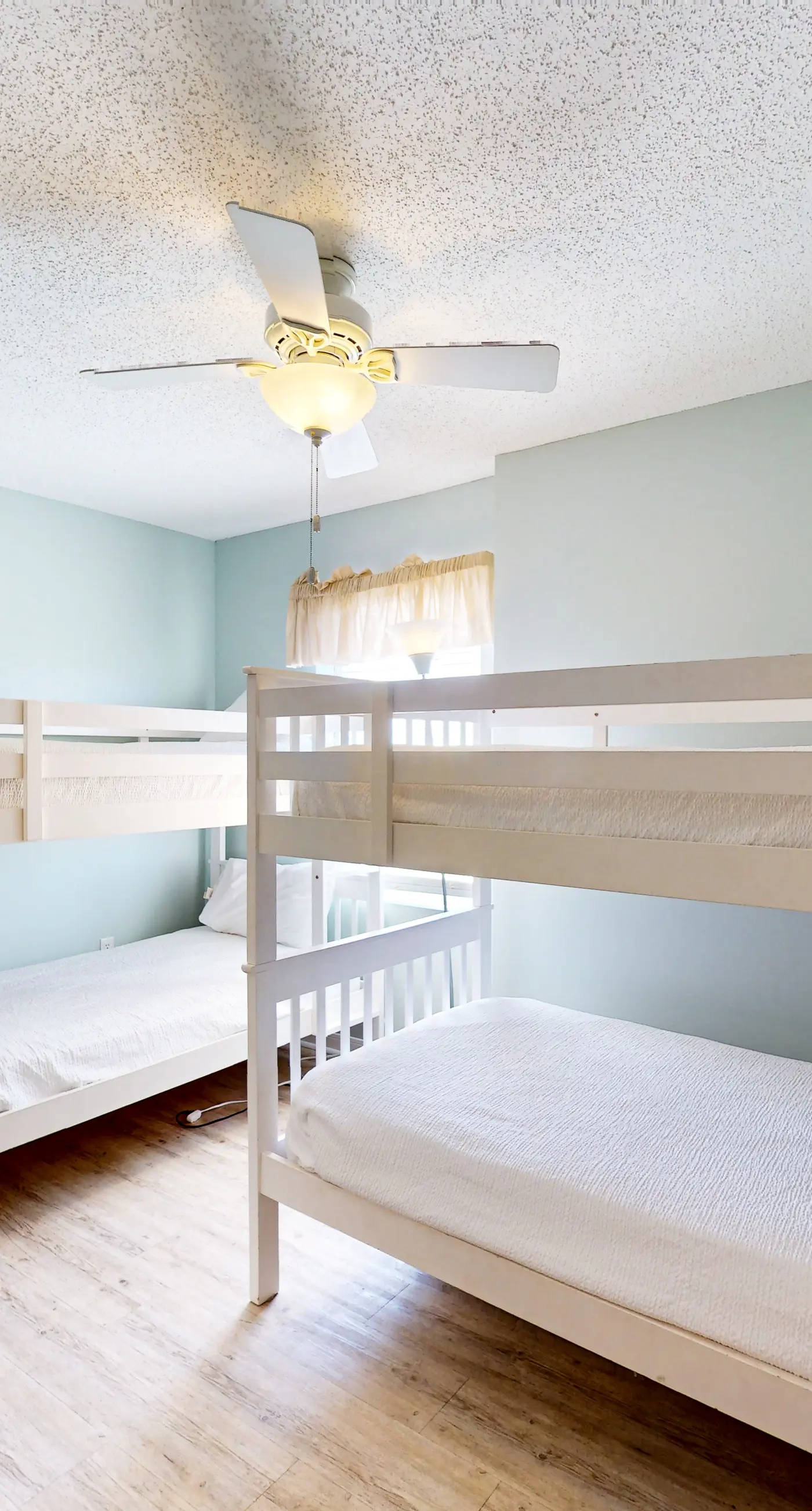 Gulf-front condo with beach views, balcony, central AC & pool