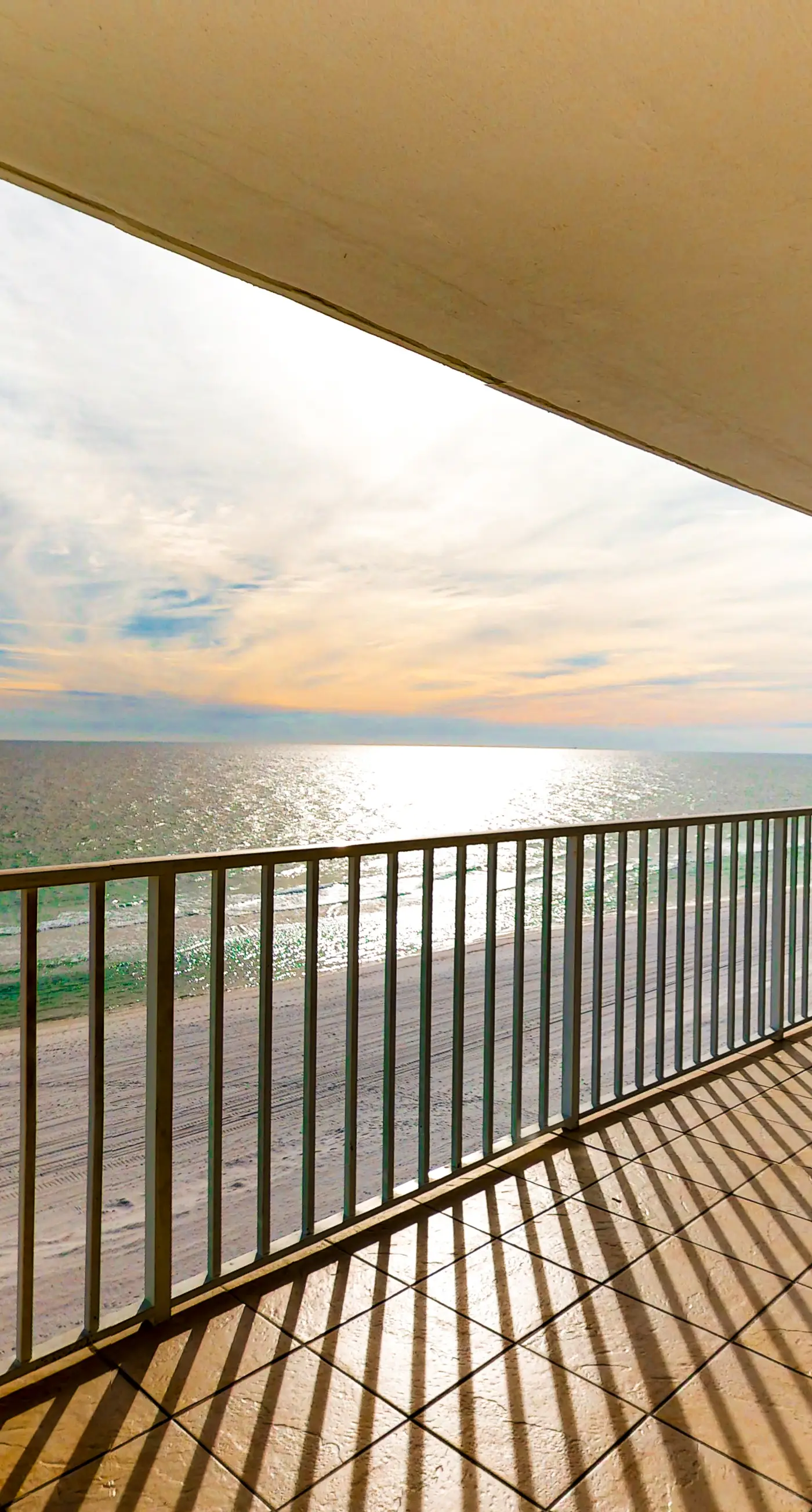 Gulf-front condo with beach views, balcony, central AC & pool