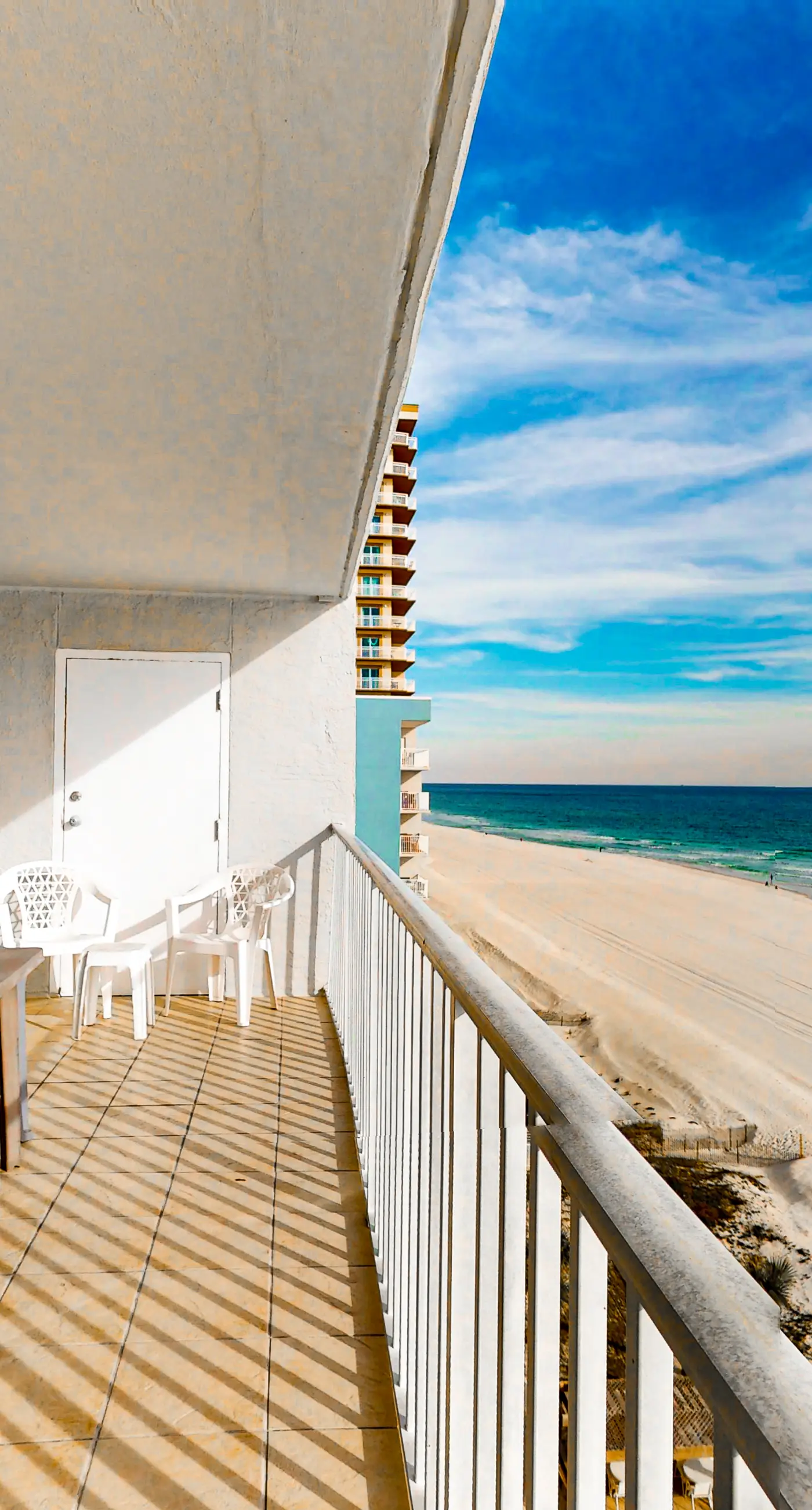 Gulf-front condo with beach views, balcony, central AC & pool