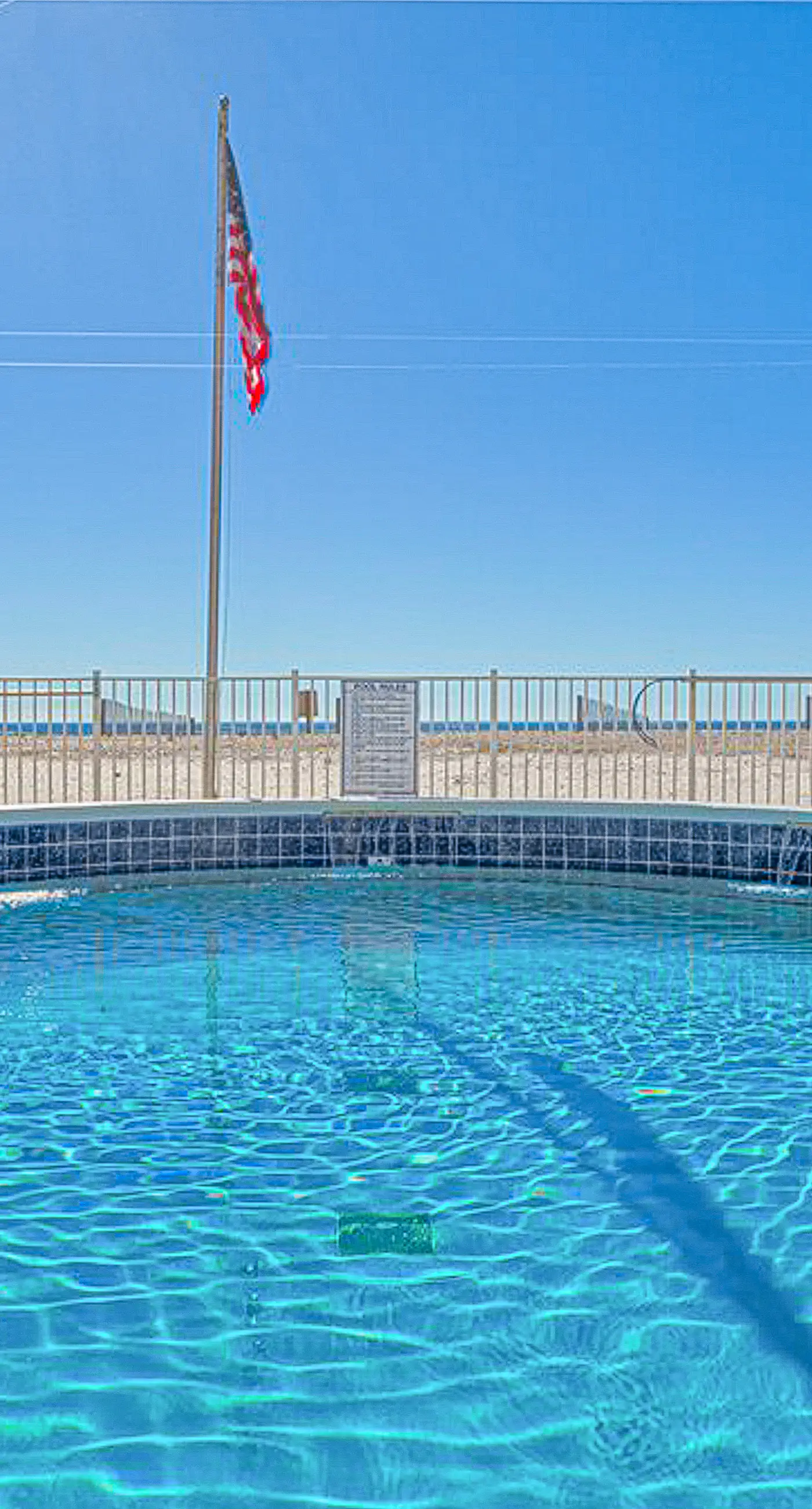 Gulf-front condo with beach views, balcony, central AC & pool
