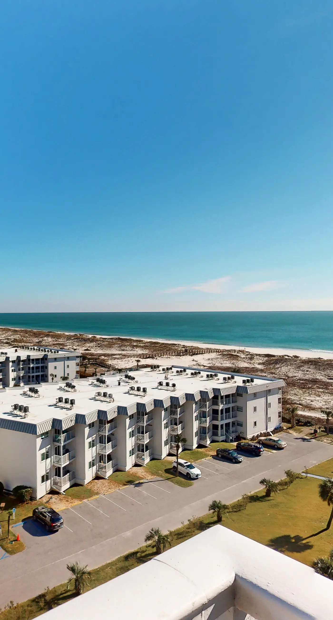 Plantation Dunes condo with Gulf views, pool, hot tubs & gym - walk to beach