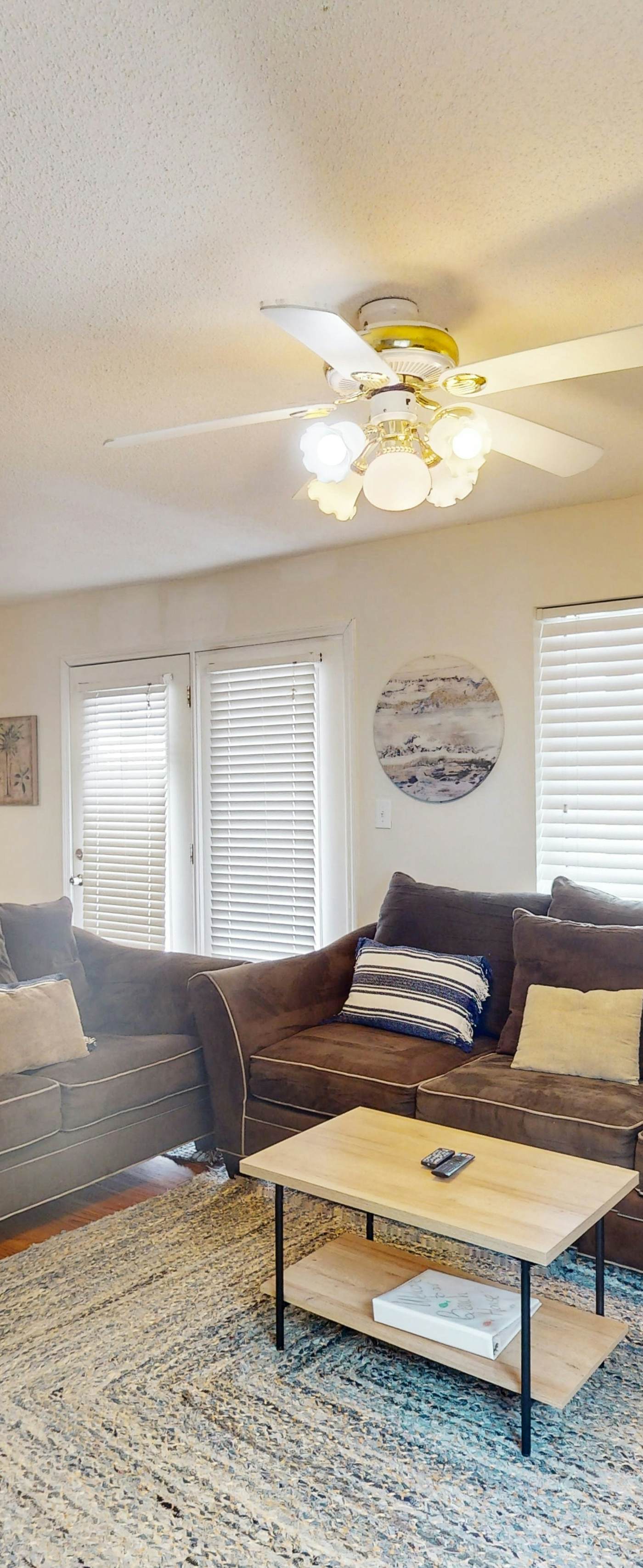 Duplex home with two-level deck, beach access, hot tub, & balcony