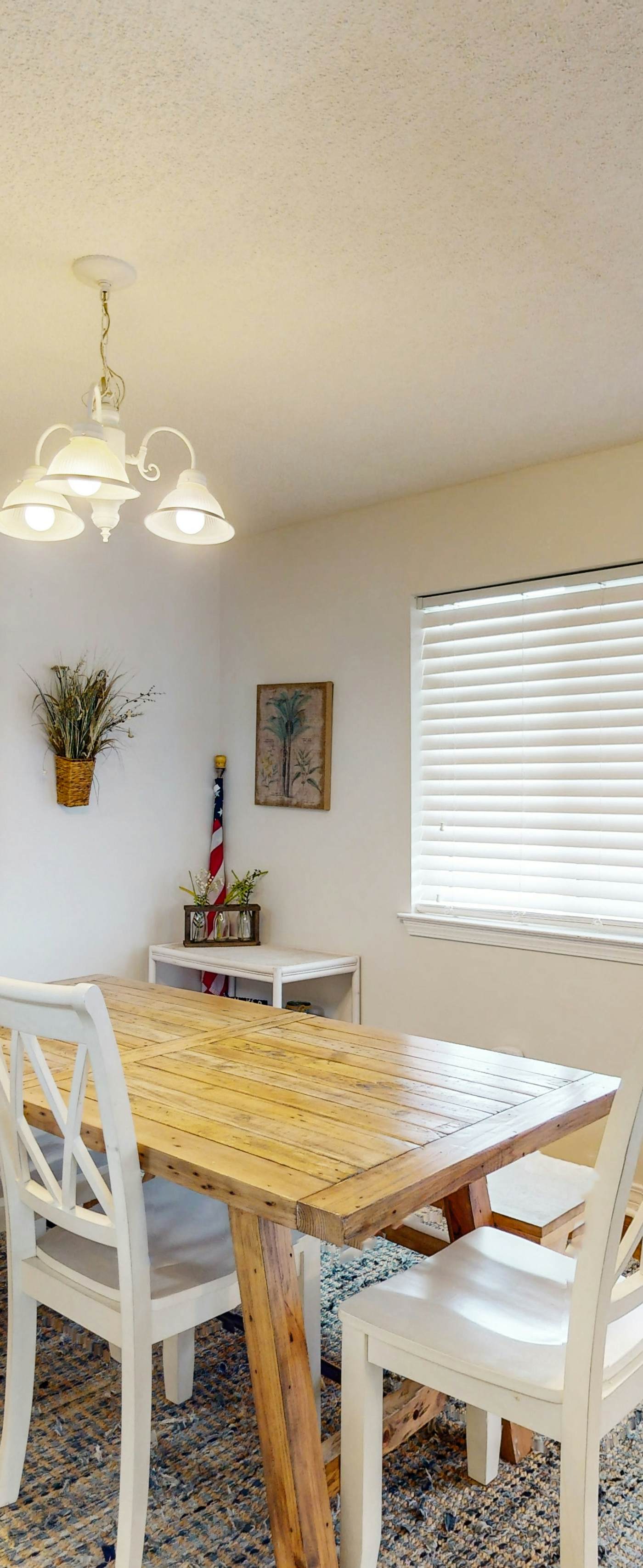 Duplex home with two-level deck, beach access, hot tub, & balcony