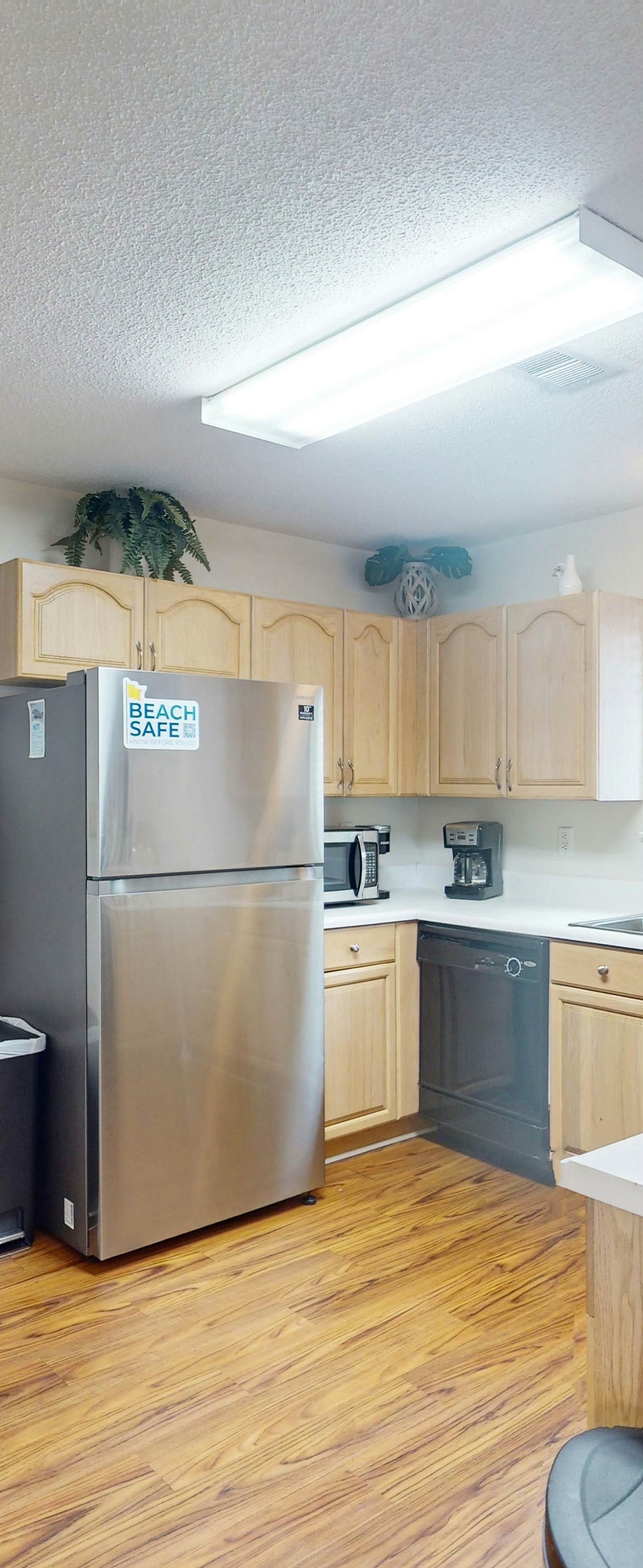 Duplex home with two-level deck, beach access, hot tub, & balcony