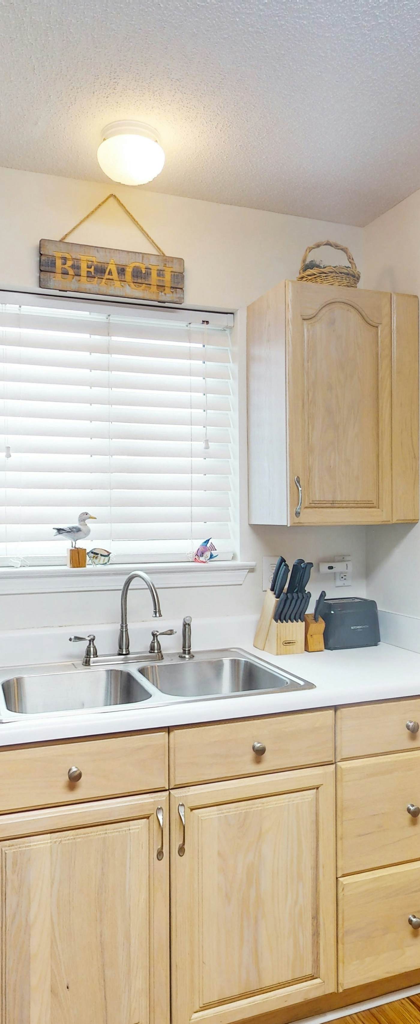 Duplex home with two-level deck, beach access, hot tub, & balcony