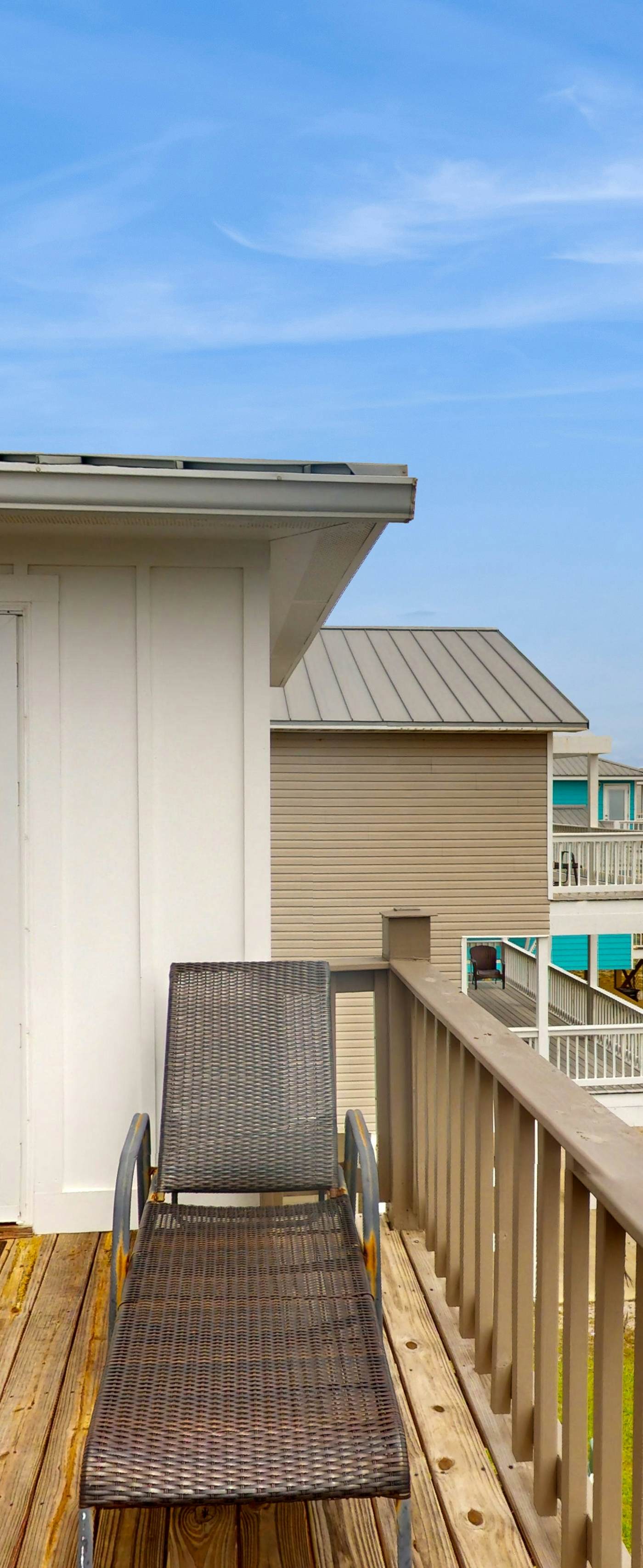 Duplex home with two-level deck, beach access, hot tub, & balcony