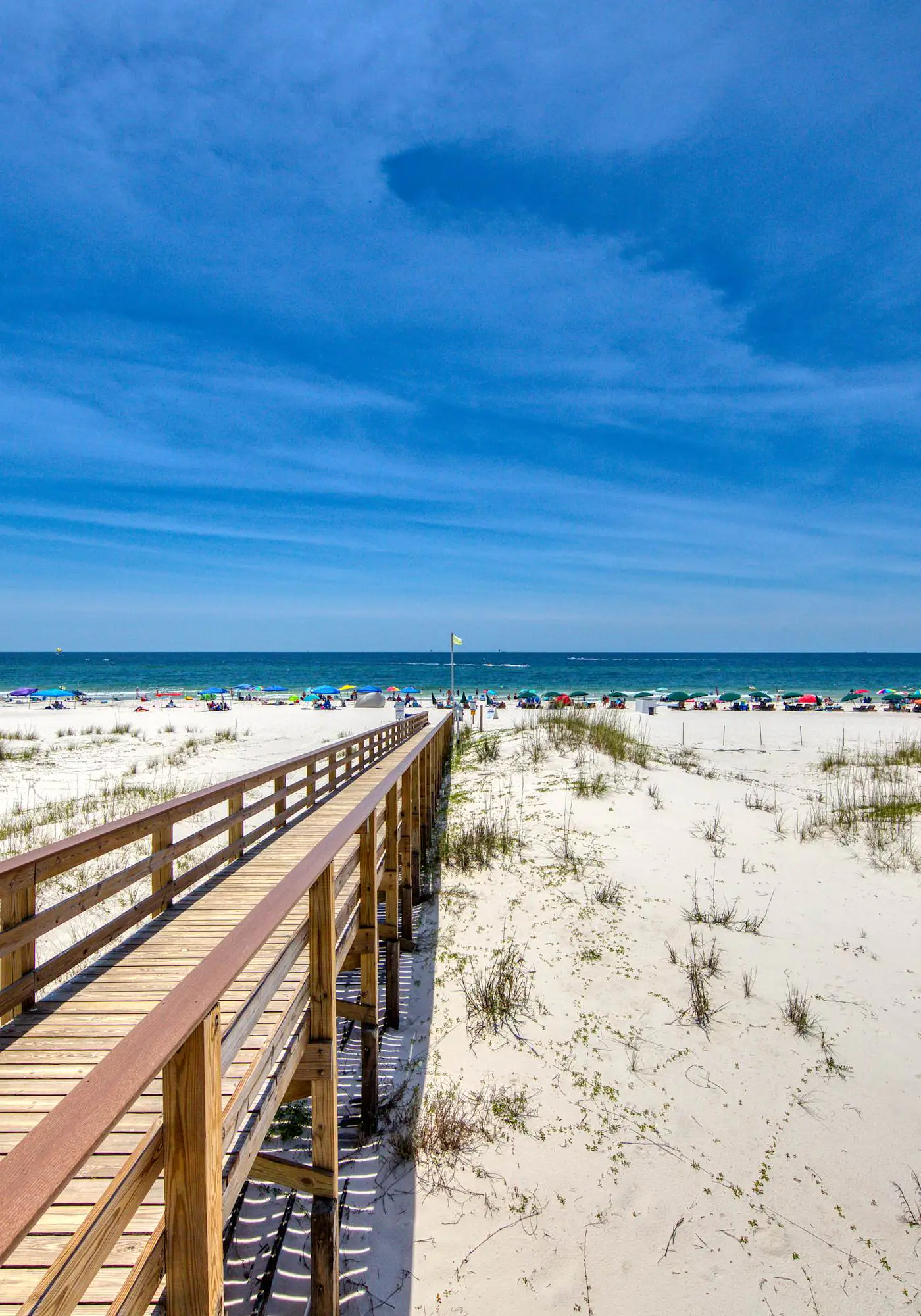 Duplex home with two-level deck, beach access, hot tub, & balcony