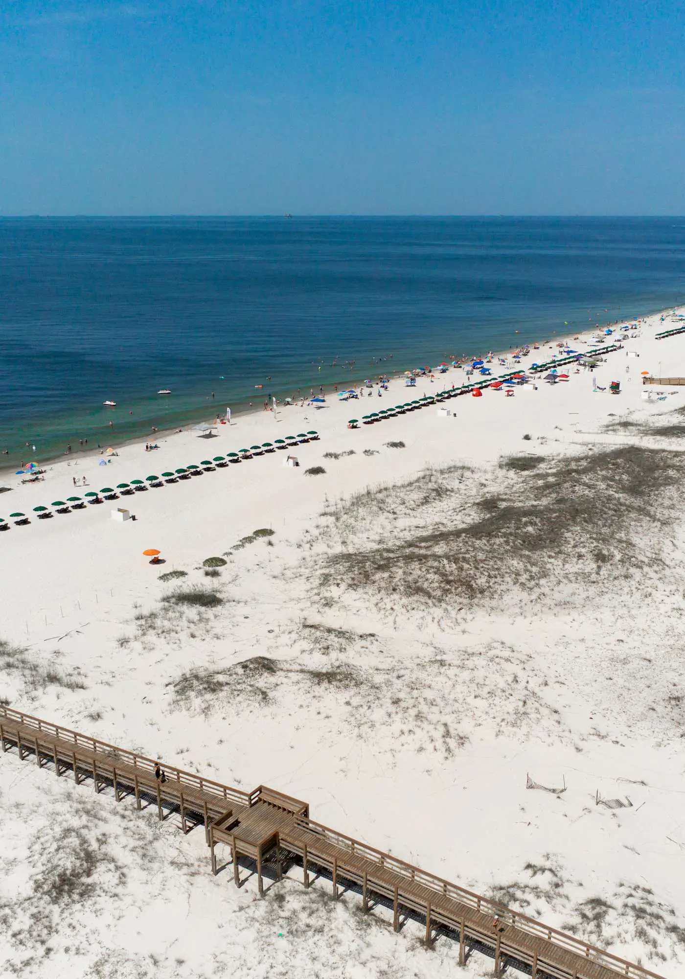Duplex home with two-level deck, beach access, hot tub, & balcony