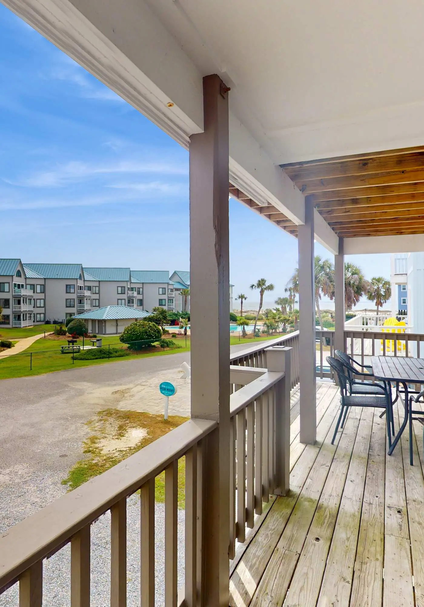 Duplex home with two-level deck, beach access, hot tub, & balcony