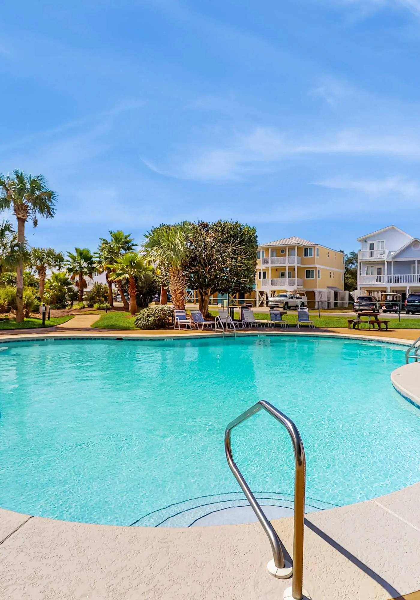Second-floor ocean view condo with WiFi, shared pools, central AC, & shared W&D