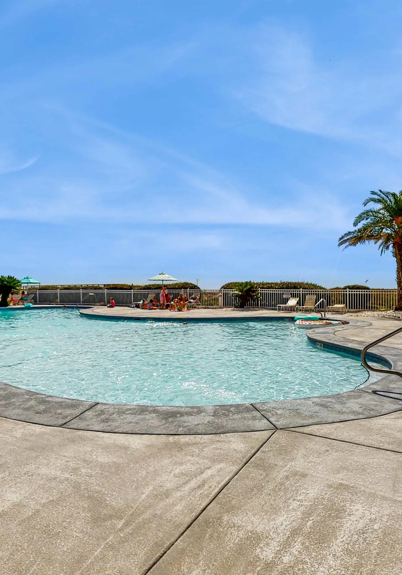 Second-floor ocean view condo with WiFi, shared pools, central AC, & shared W&D