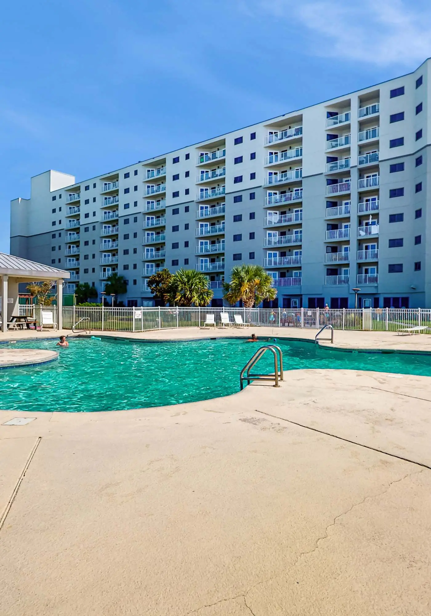 Second-floor ocean view condo with WiFi, shared pools, central AC, & shared W&D