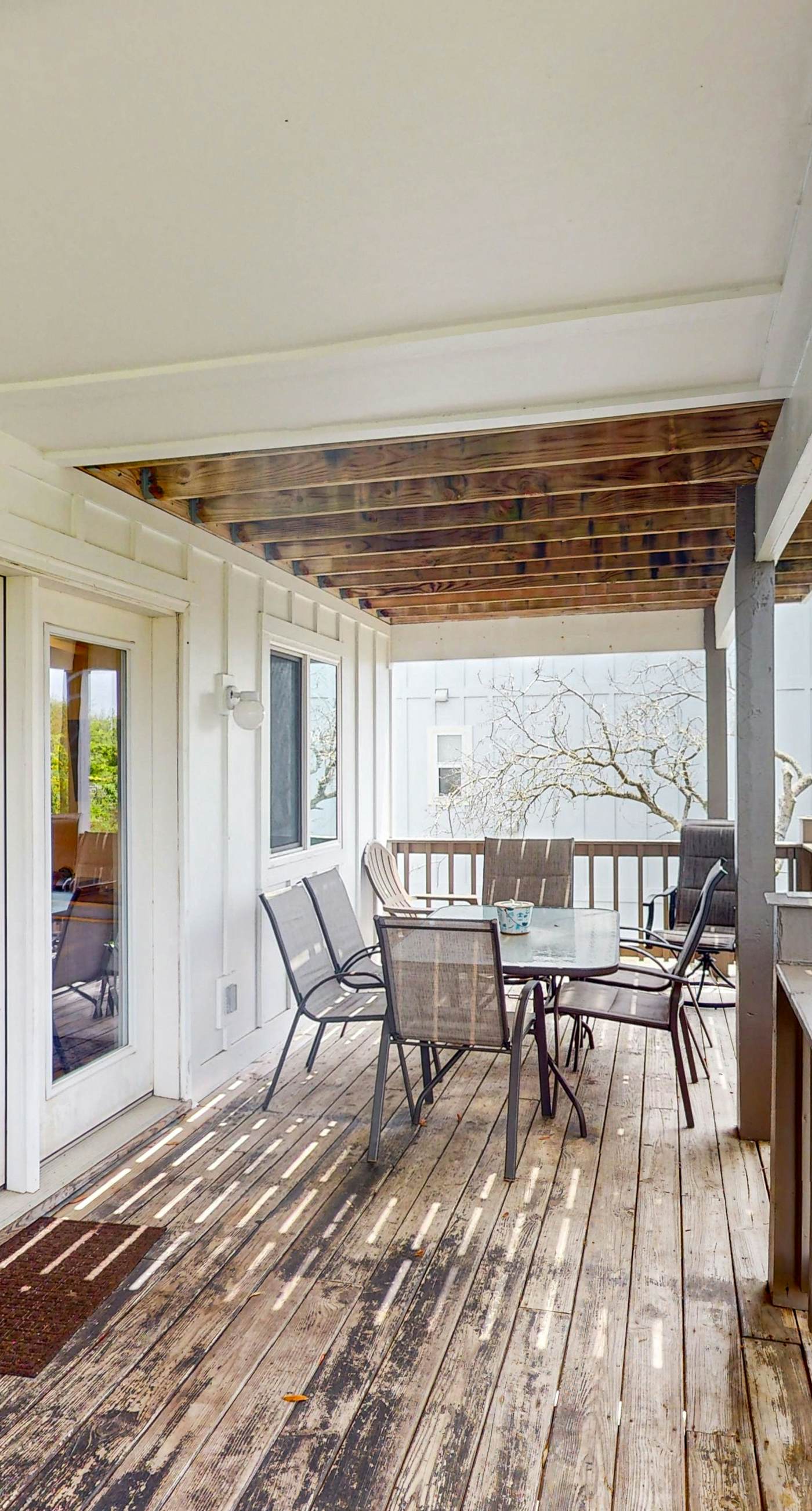 Gulf view home with two-level deck, beach access & shared pools, hot tub, gym