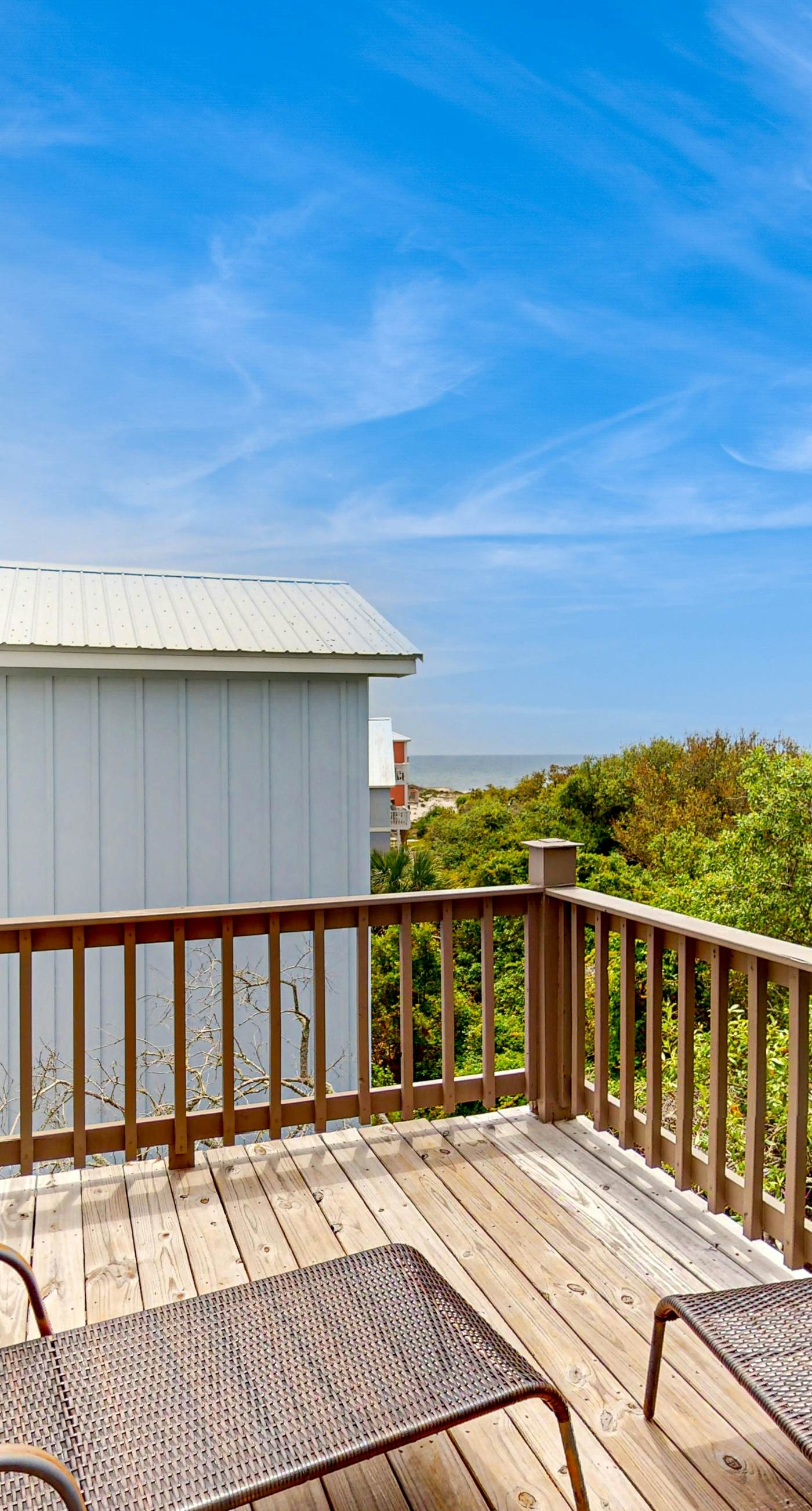 Gulf view home with two-level deck, beach access & shared pools, hot tub, gym
