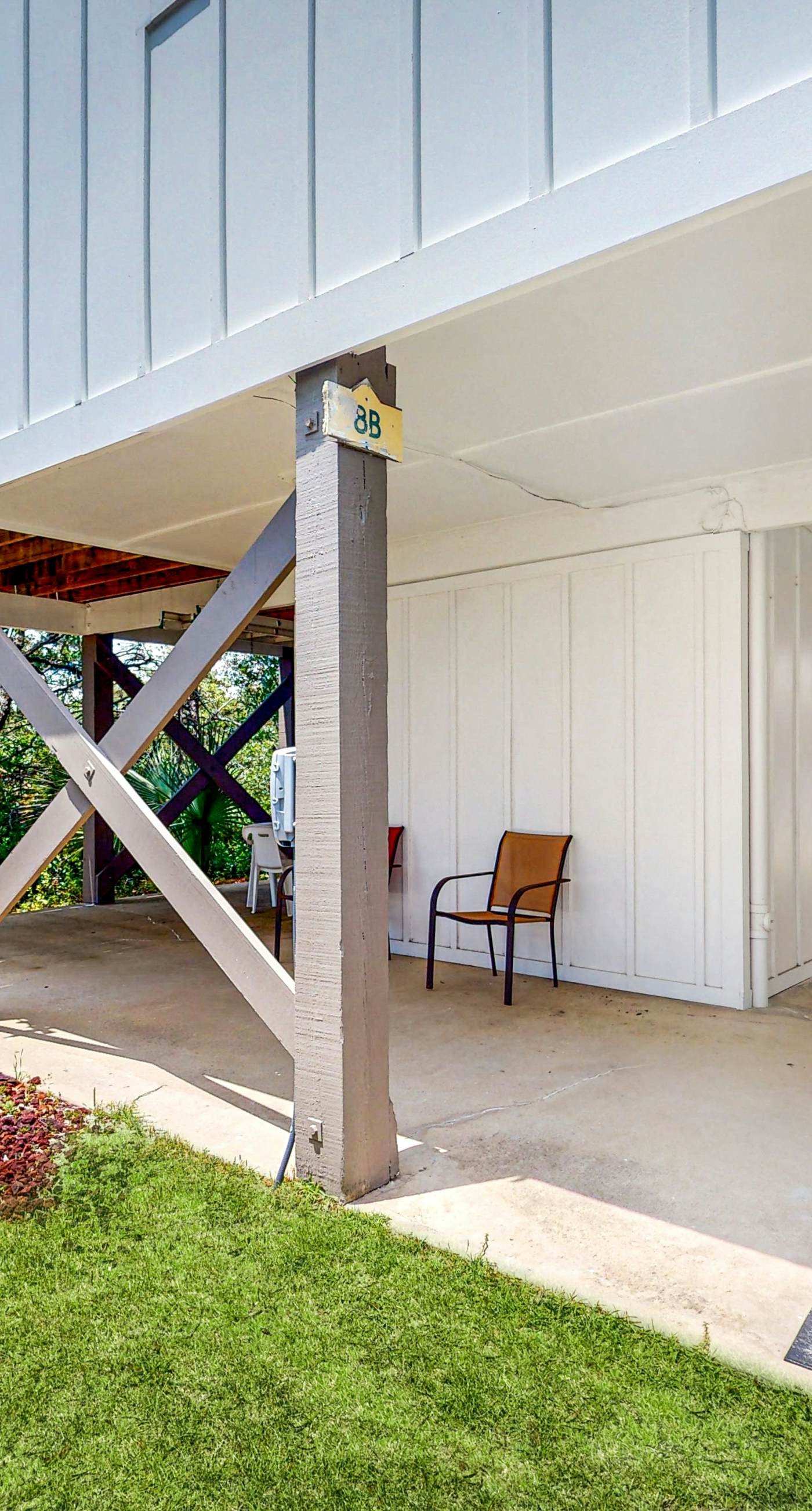 Gulf view home with two-level deck, beach access & shared pools, hot tub, gym