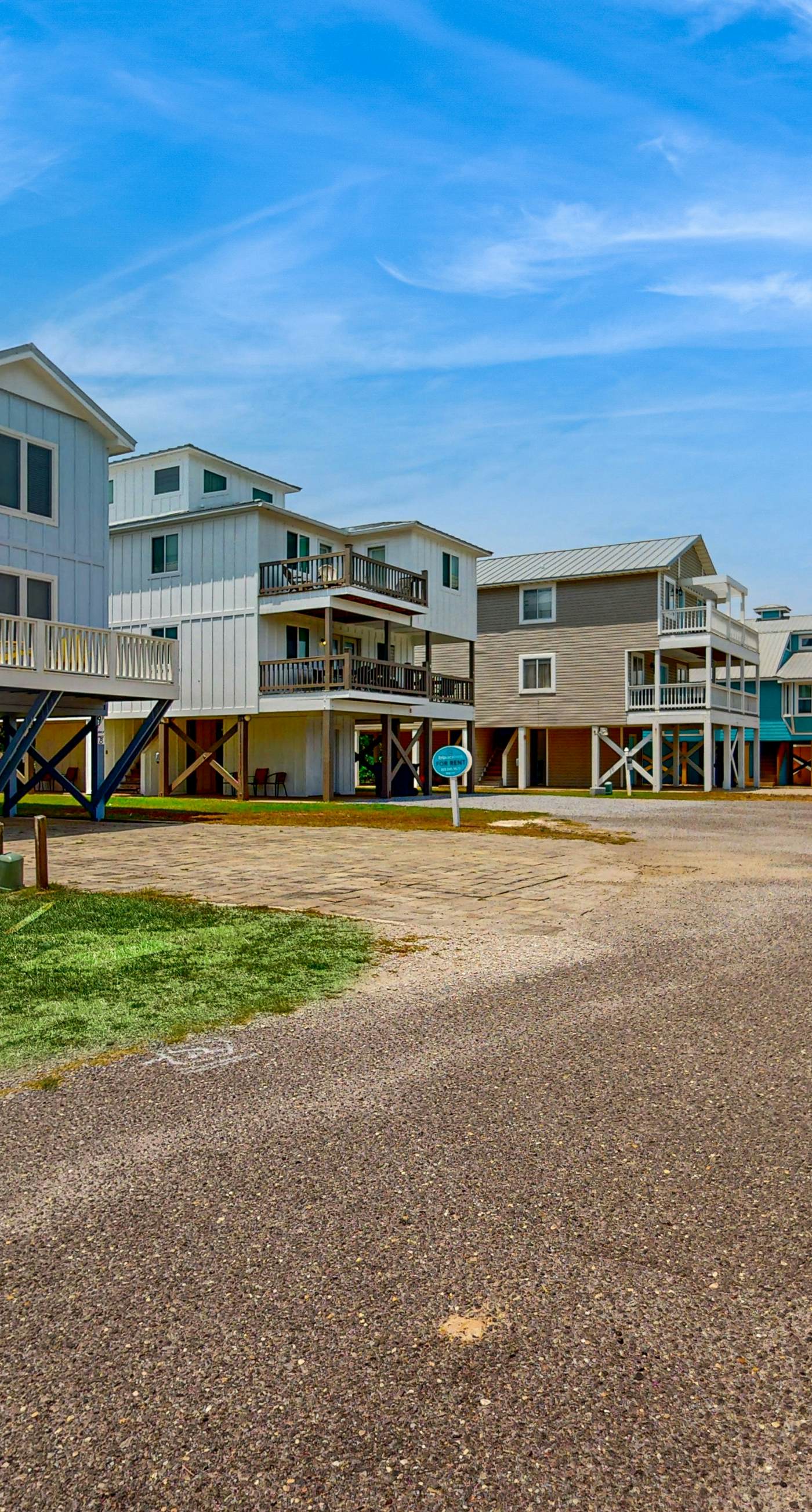 Gulf view home with two-level deck, beach access & shared pools, hot tub, gym