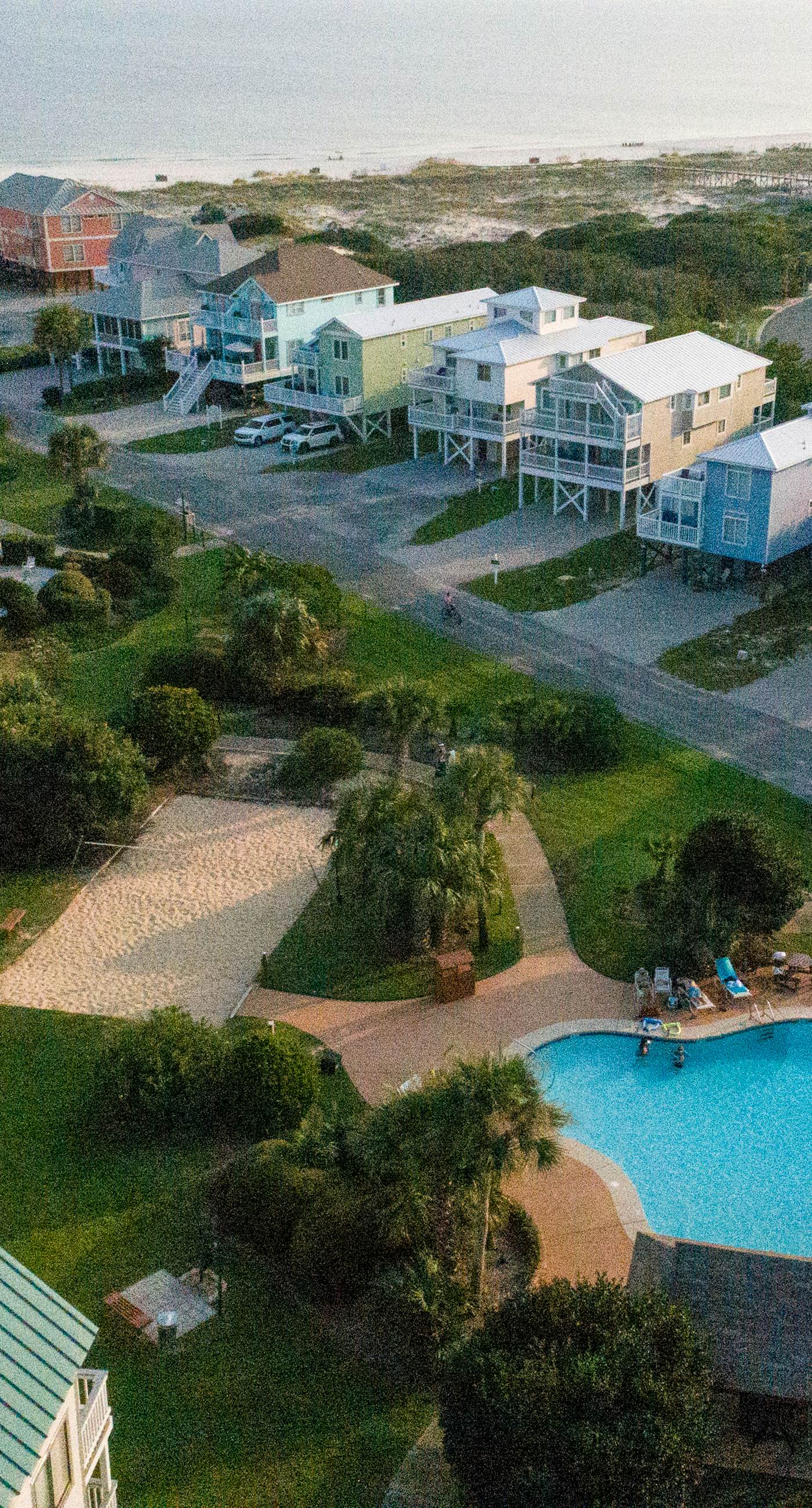 Gulf view home with two-level deck, beach access & shared pools, hot tub, gym