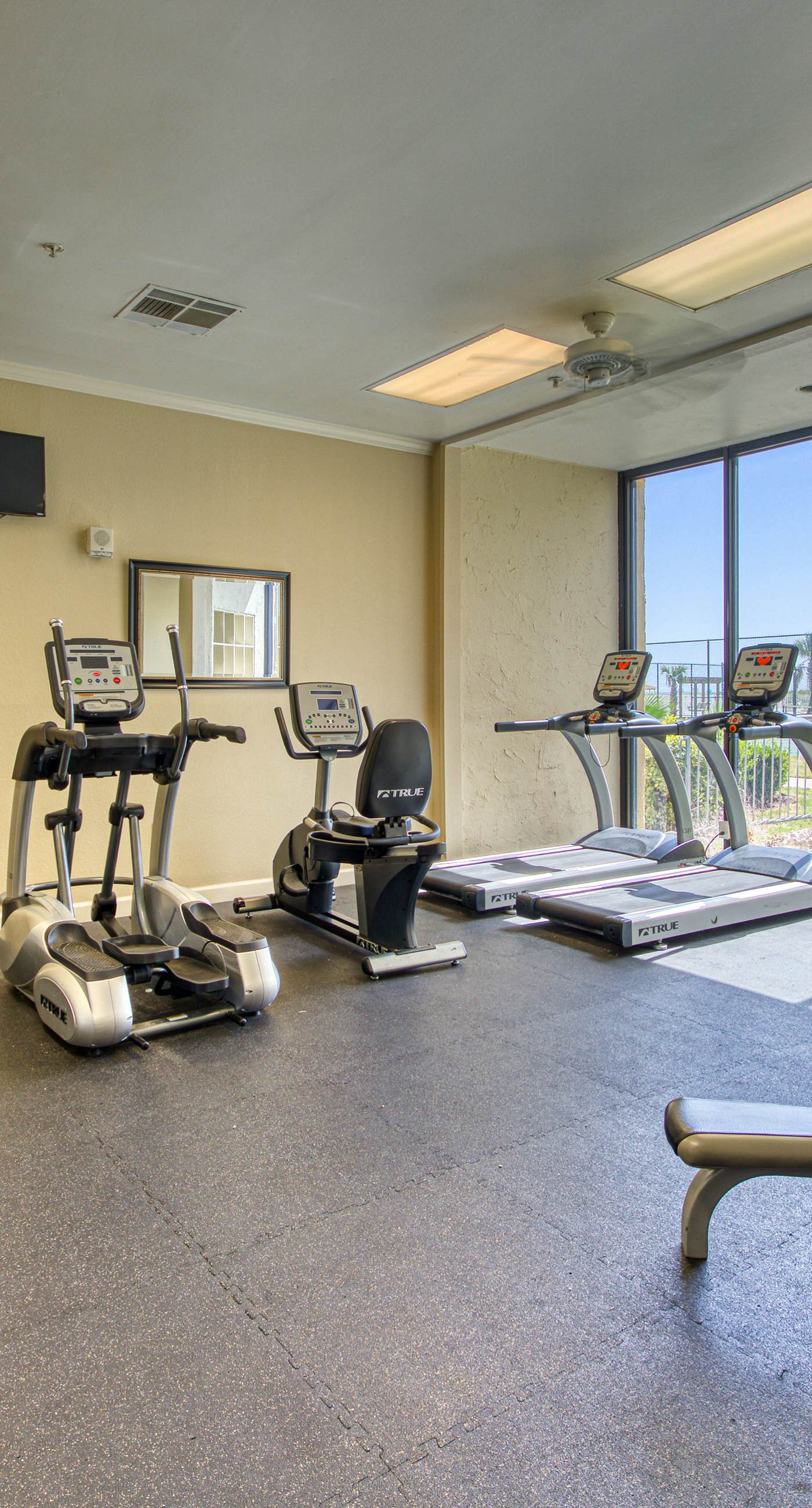 Gulf view home with two-level deck, beach access & shared pools, hot tub, gym