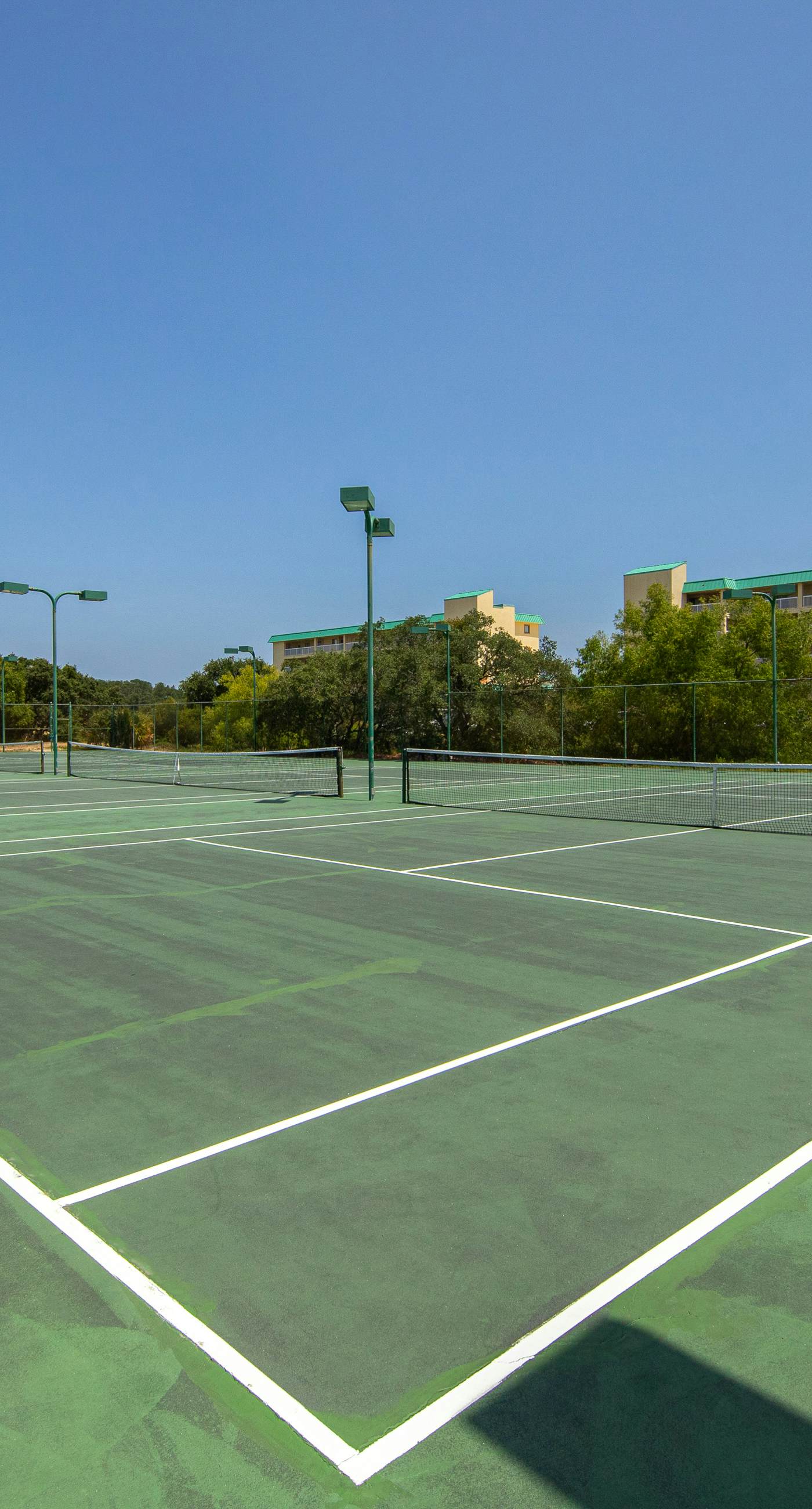 Gulf view home with two-level deck, beach access & shared pools, hot tub, gym