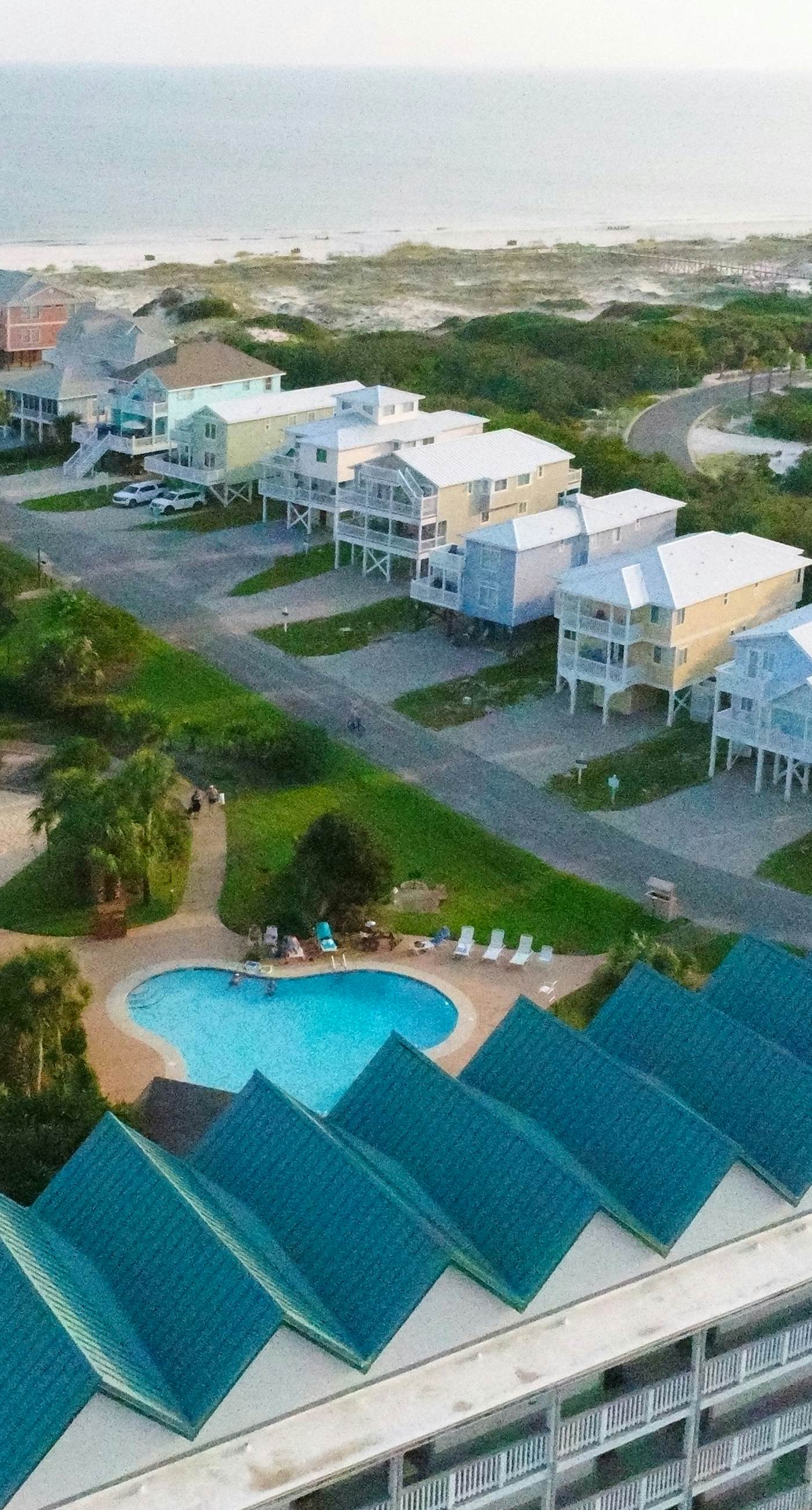 Gulf view home with two-level deck, beach access & shared pools, hot tub, gym