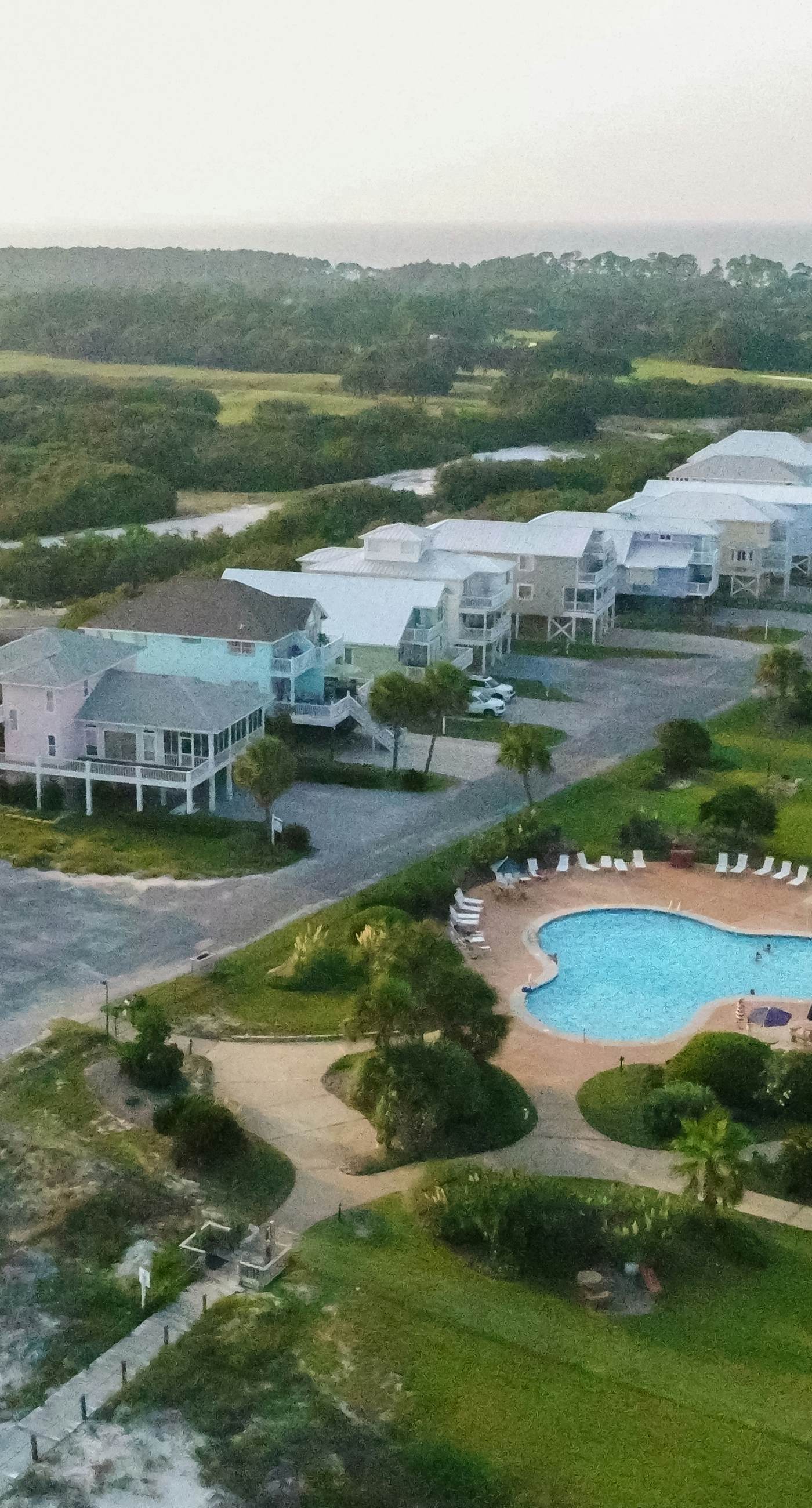 Gulf view home with two-level deck, beach access & shared pools, hot tub, gym