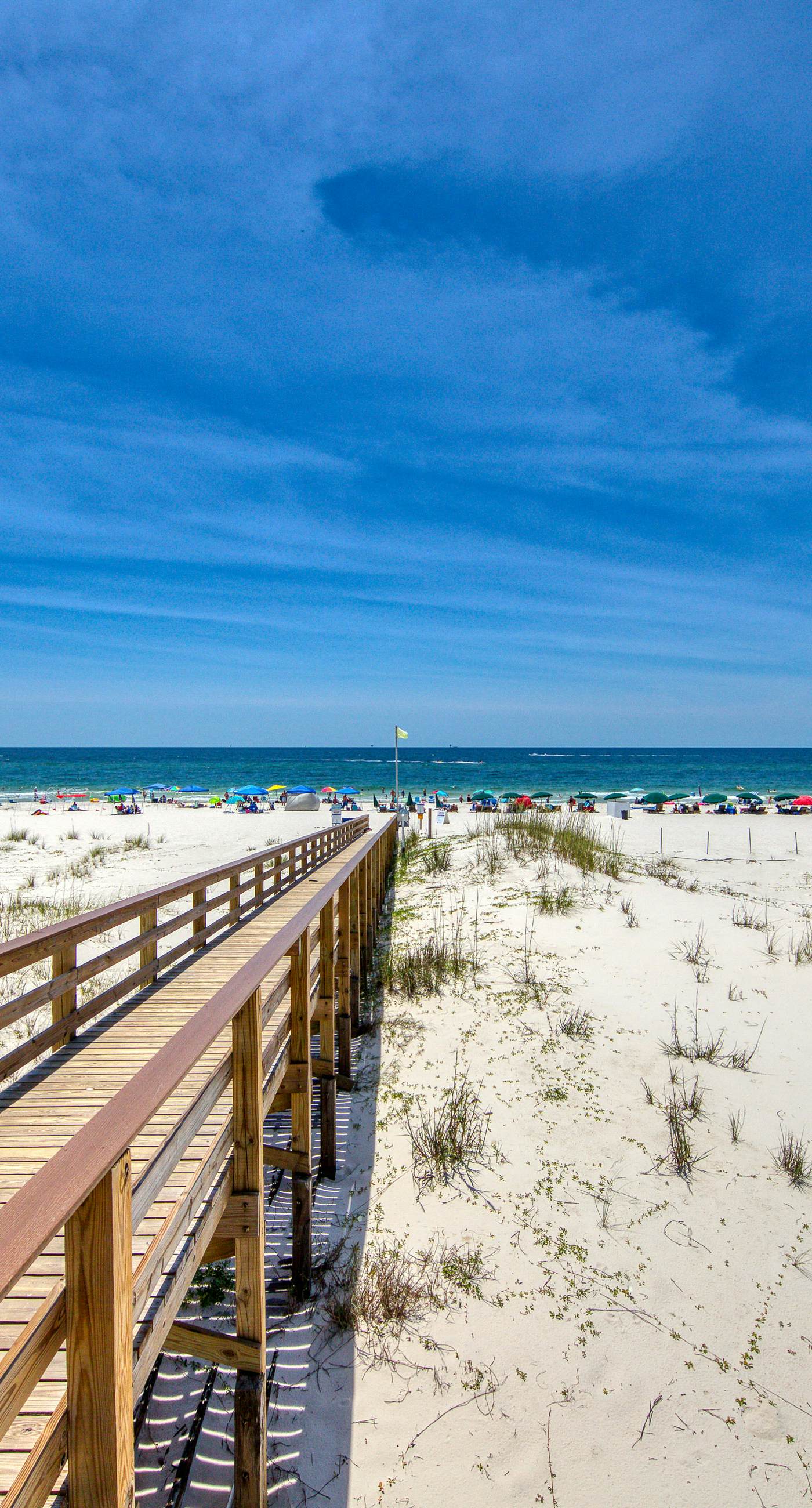 Gulf view home with two-level deck, beach access & shared pools, hot tub, gym